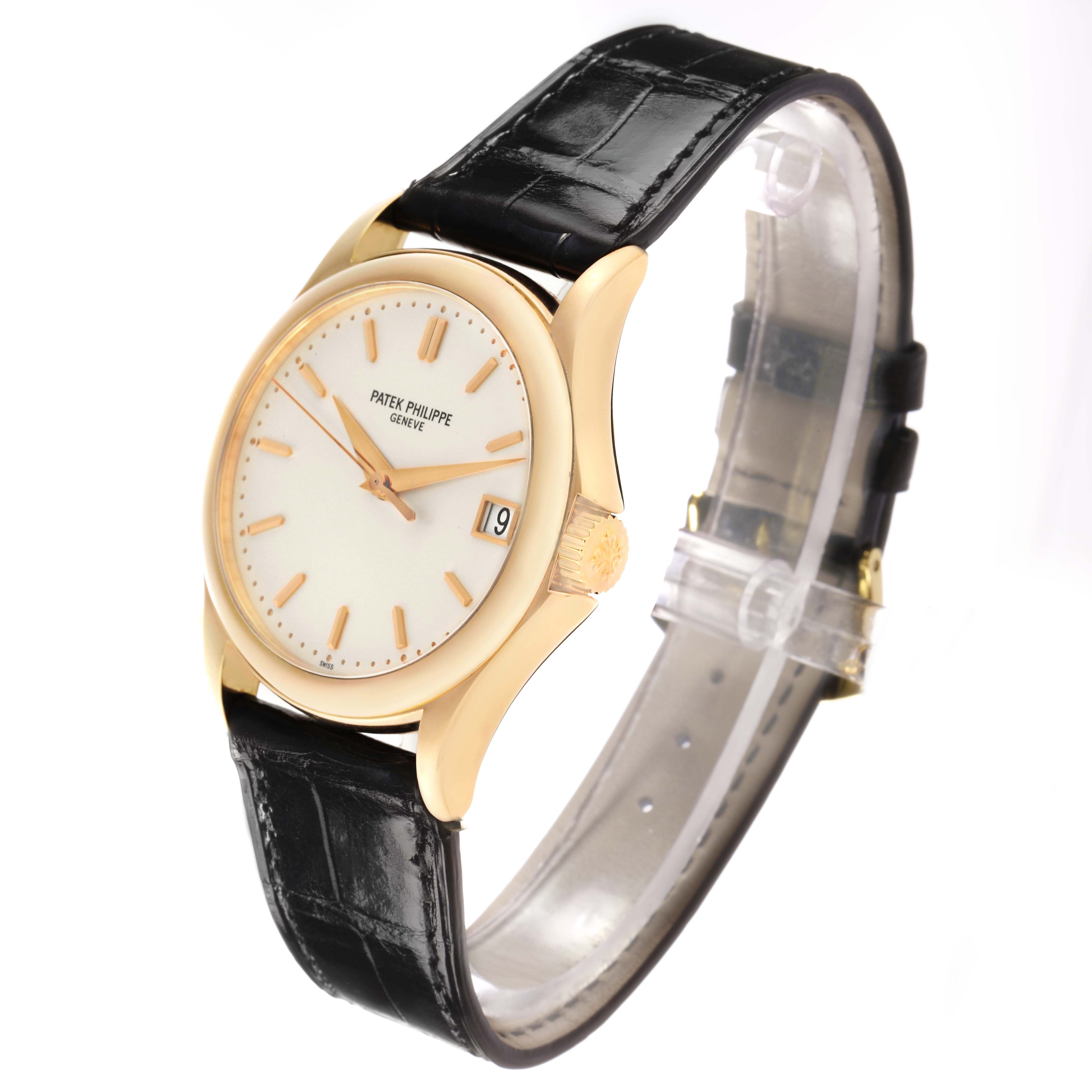 The Patek Philippe Calatrava 5107J Men's Yellow Gold Silver Dial watch is shown at a three-quarter angle, highlighting the face, bezel, crown, and strap.