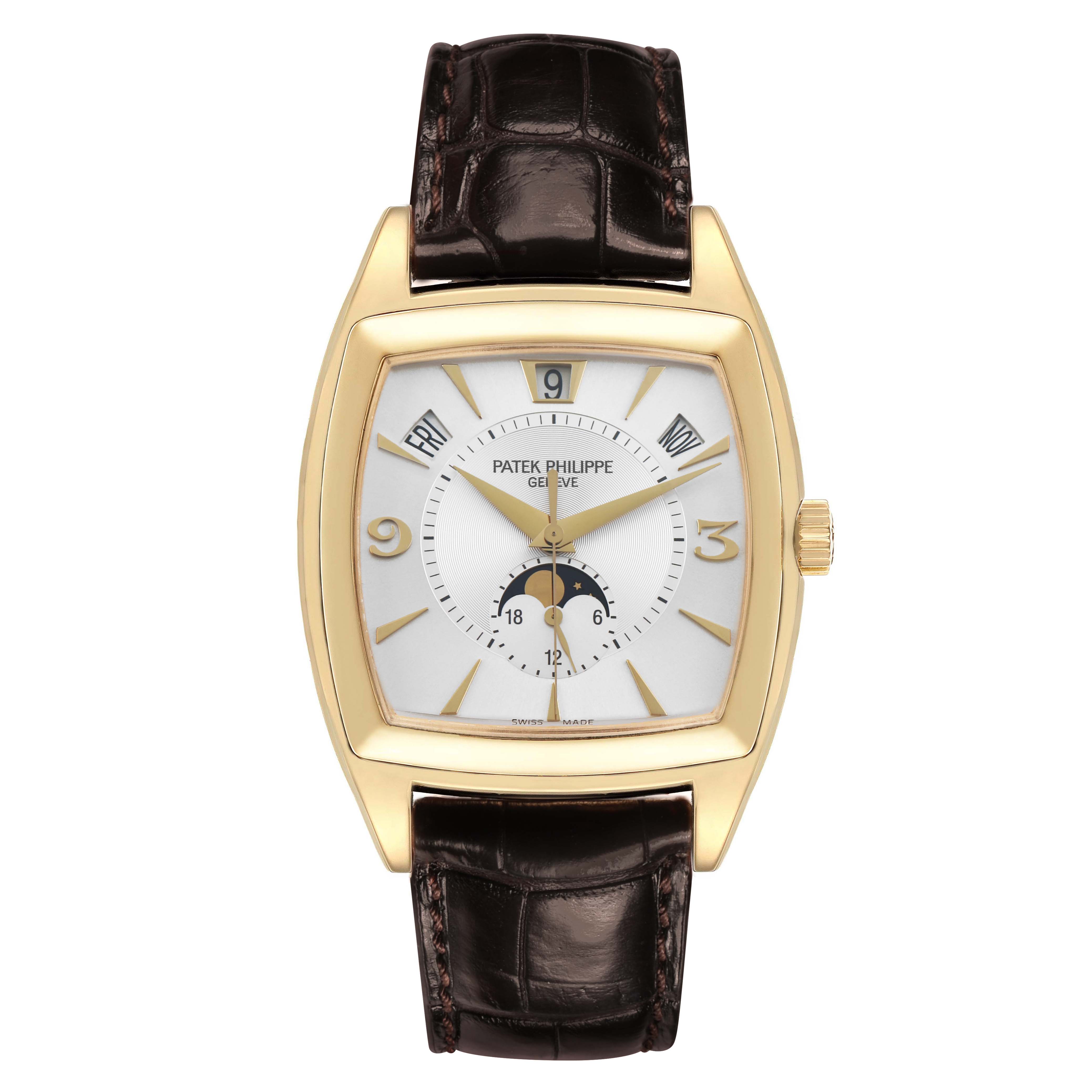 The Patek Philippe Gondolo 5135J Men's Yellow Gold White Dial watch is shown from a front angle, highlighting the dial, gold case, and dark leather strap.