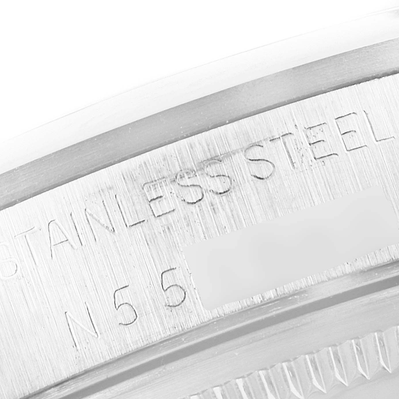 This close-up image shows the engraved stainless steel case back of a Rolex Air-King 14000 Men's Stainless Steel Black Dial 14000 Men's Stainless Steel Black Dial watch.