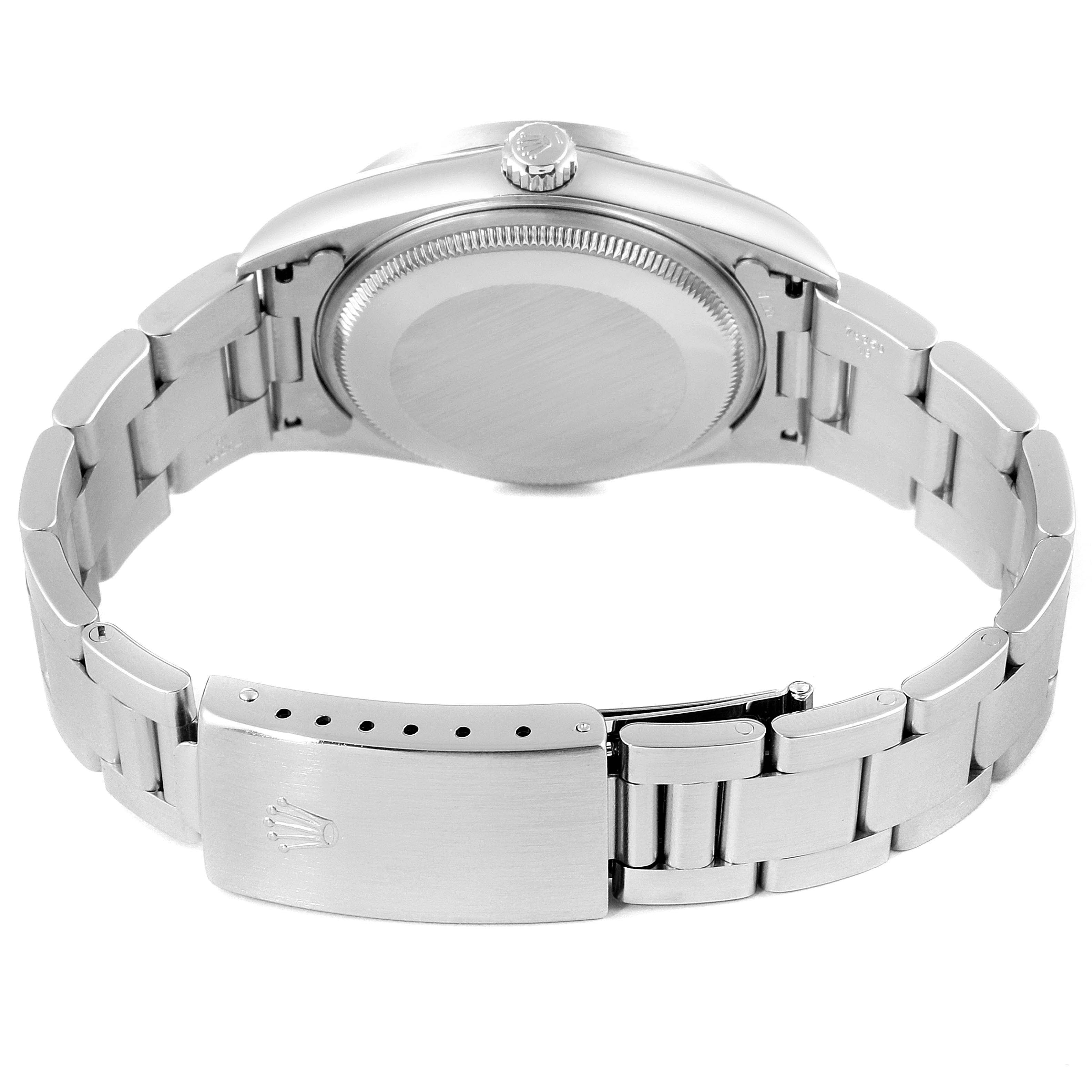 The image shows the back and clasp of a Rolex Air-King 14010 Men's Stainless Steel Black Dial 14010 Men's Stainless Steel Black Dial watch, highlighting the stainless steel bracelet and case back.