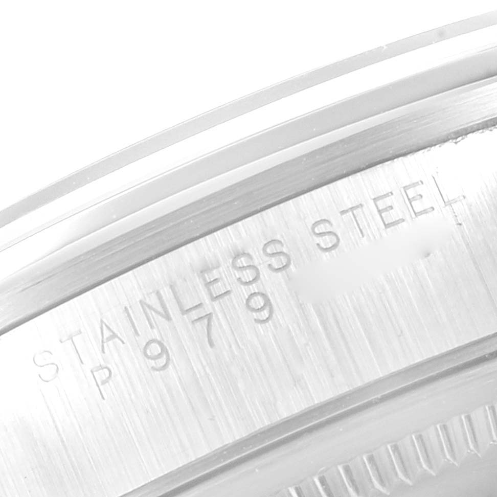 This image shows a close-up of the stainless steel case back and engraved serial number on a Rolex Air-King 14000 Men's Stainless Steel Silver Dial 14000 Men's Stainless Steel Silver Dial watch.