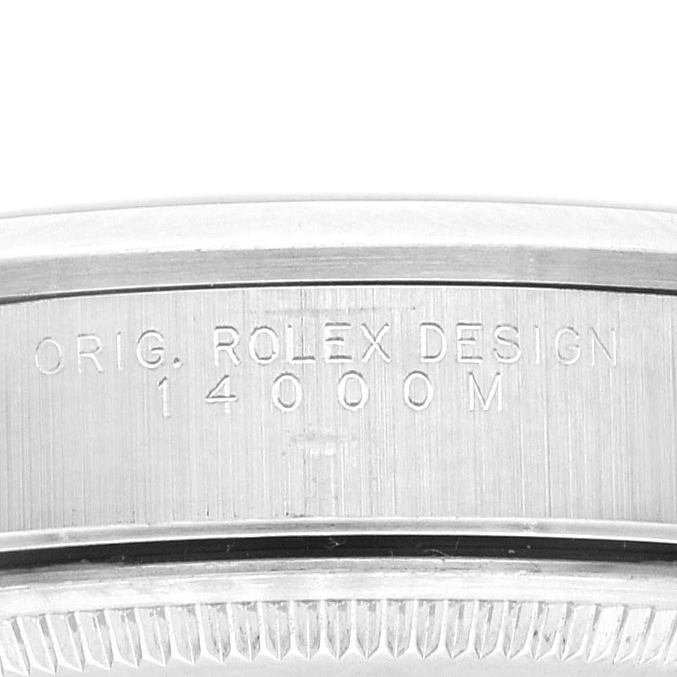 The image shows a close-up of the case side of the Rolex Air-King 14000M Men's Stainless Steel Black Dial 14000M Men's Stainless Steel Black Dial watch, displaying engraved model details.