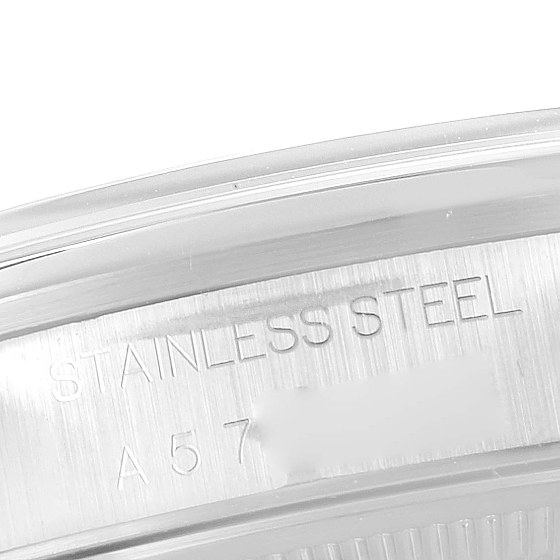 The image shows a close-up of the stainless steel casing with engraved text on a Rolex Air-King 14000 Men's Stainless Steel White Dial 14000 Men's Stainless Steel White Dial watch.