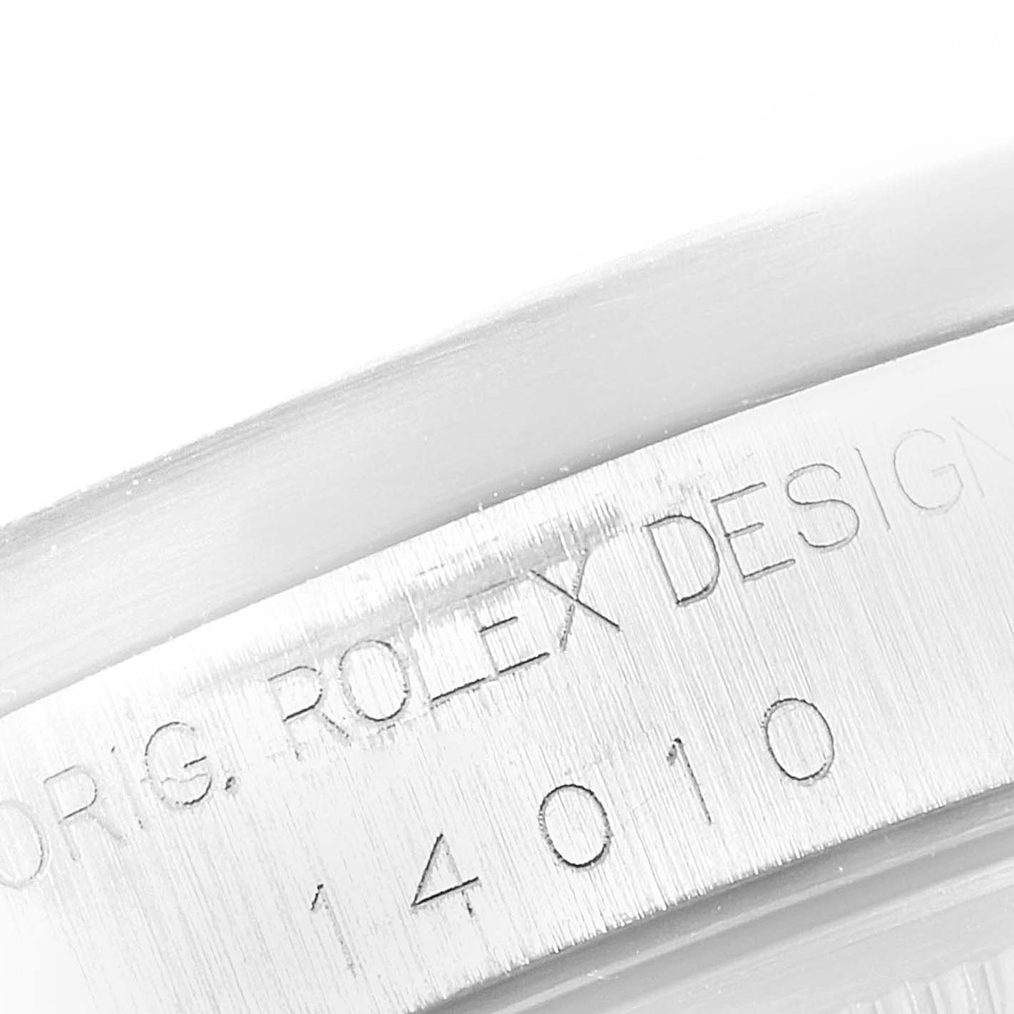 The image shows a close-up of the engraved side of the casing for a Rolex Air-King 14010 Men's Stainless Steel White Dial 14010 Men's Stainless Steel White Dial watch.