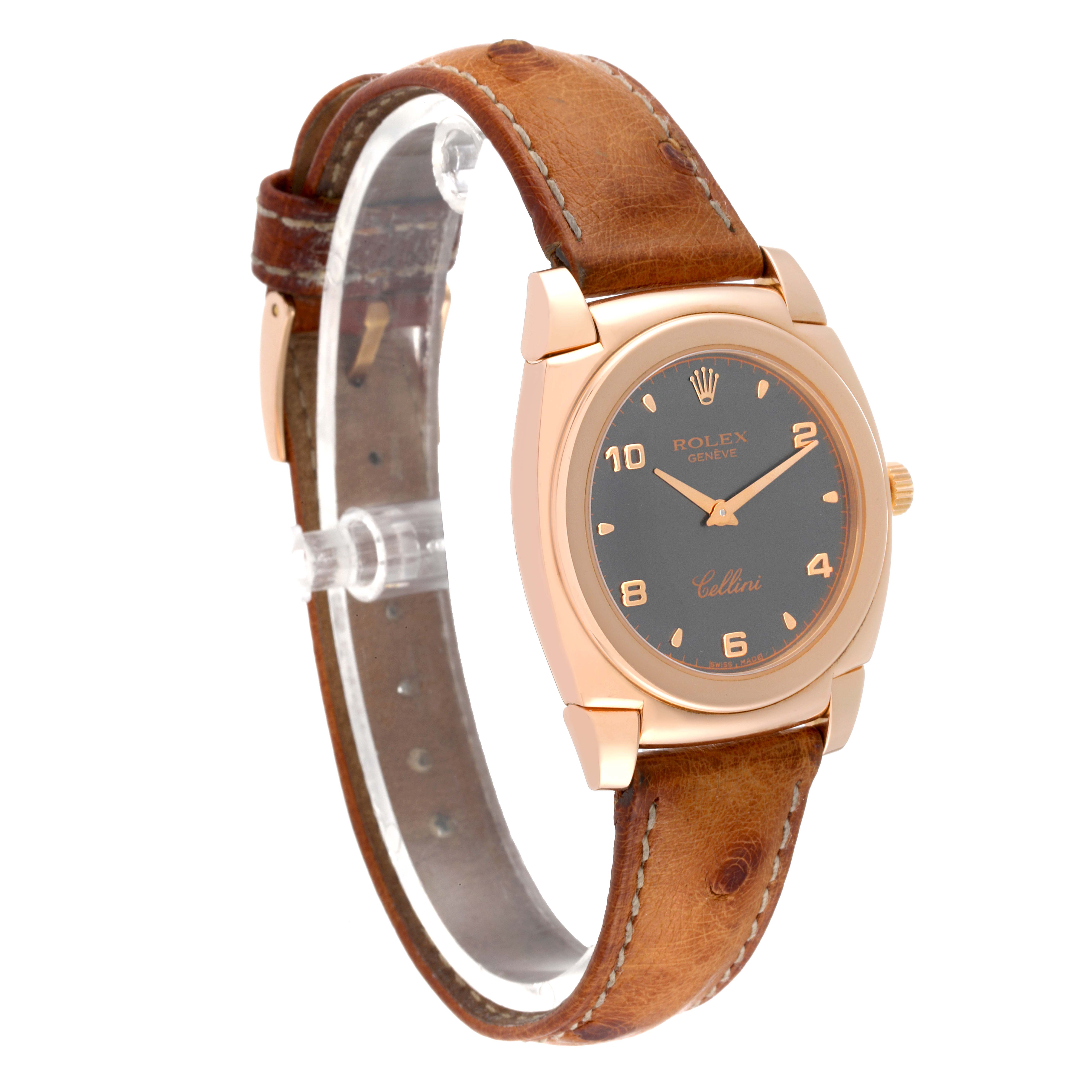 The Rolex Cellini 5320 Women's Rose Gold Grey Dial 5320 Women's Rose Gold Grey Dial watch is shown from a front left angle, displaying its brown leather strap and gold case with a black dial.