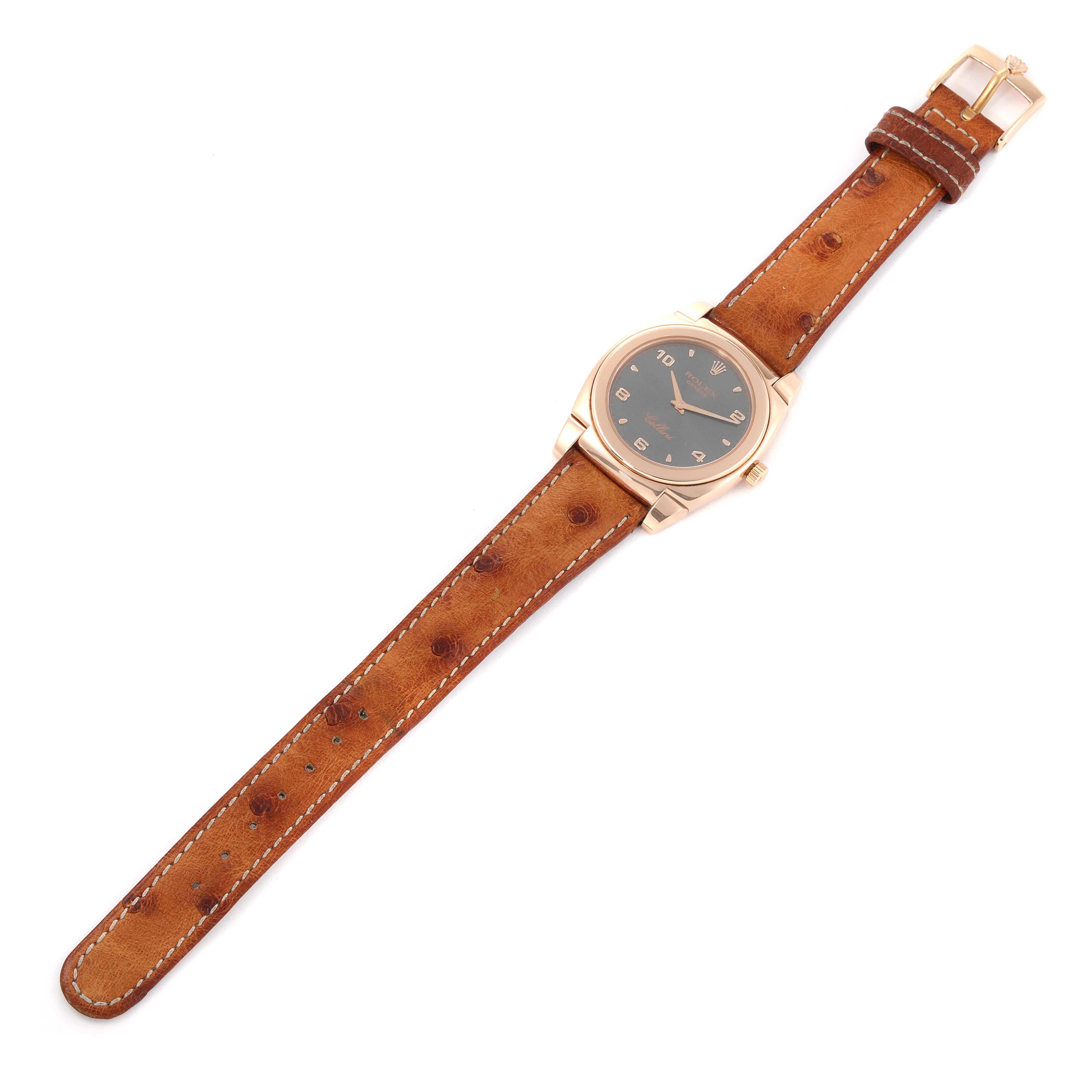 This image shows a Rolex Cellini 5320 Women's Rose Gold Grey Dial 5320 Women's Rose Gold Grey Dial watch from a top-down angle, highlighting its dial, case, and leather strap.