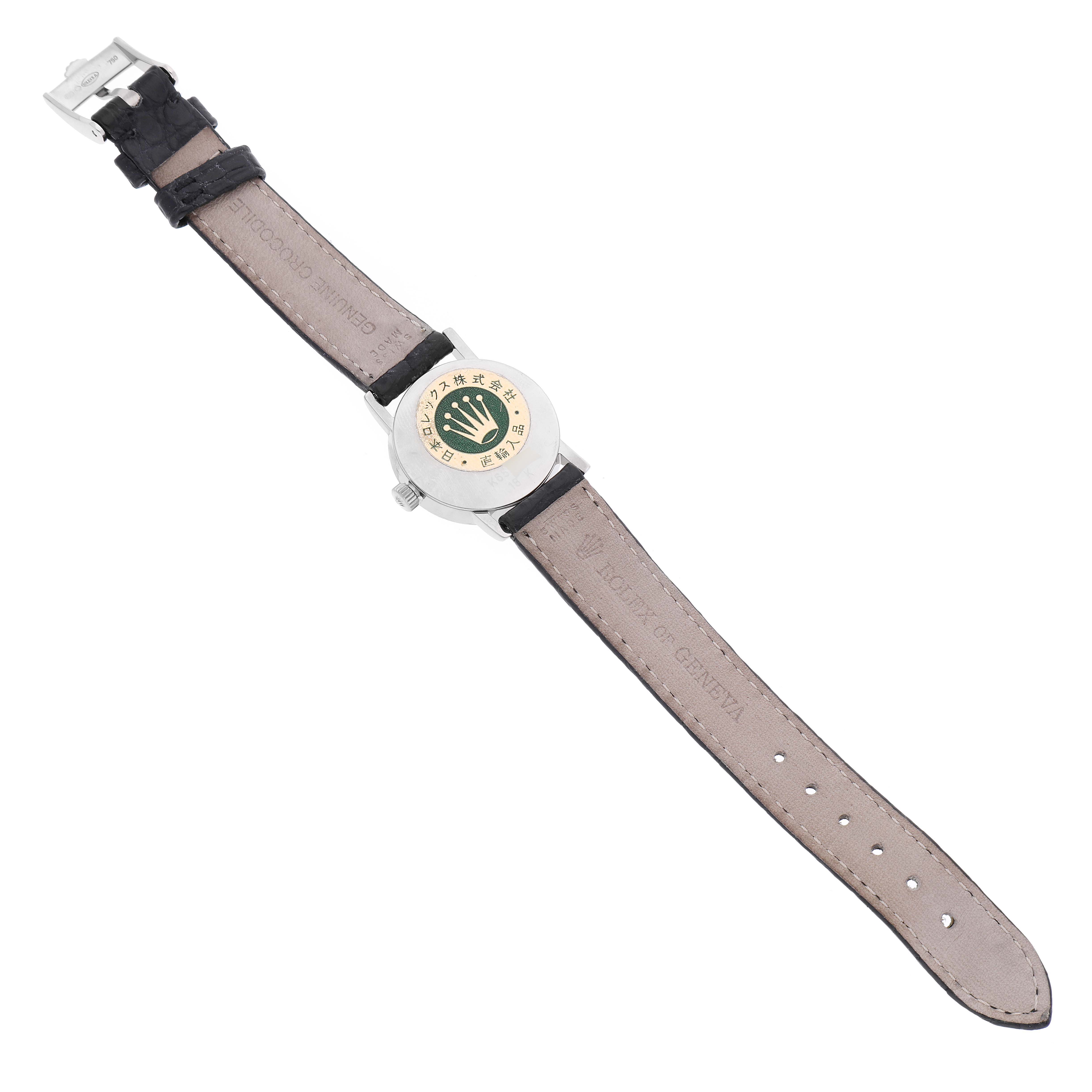 The image shows the back view of a Rolex Cellini 6110 Women's White Gold Silver Dial 6110 Women's White Gold Silver Dial watch, displaying the clasp, leather strap, and case back with the Rolex logo.