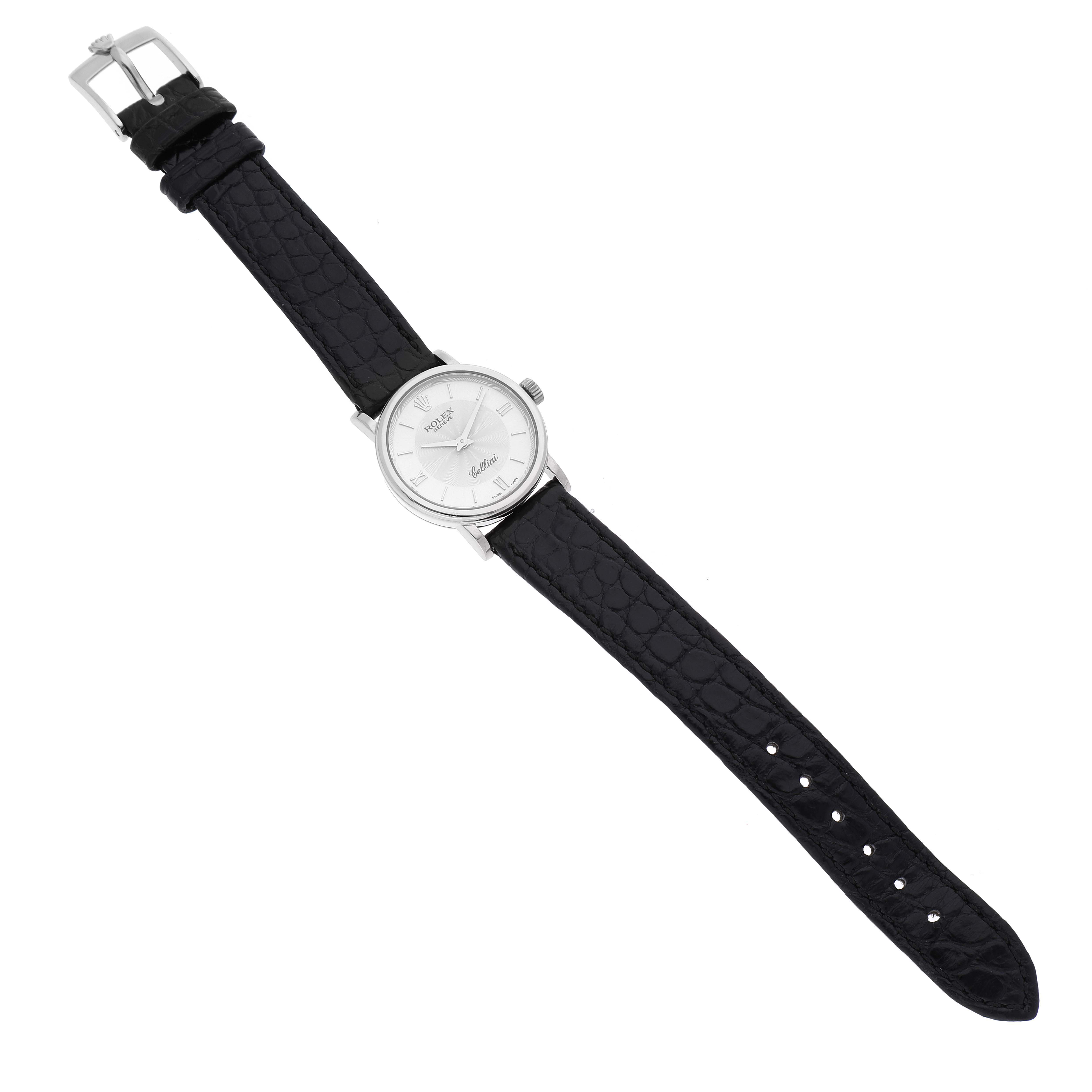 The image shows a full view of a Rolex Cellini 6110 Women's White Gold Silver Dial 6110 Women's White Gold Silver Dial watch, displaying its black leather strap and white round dial.