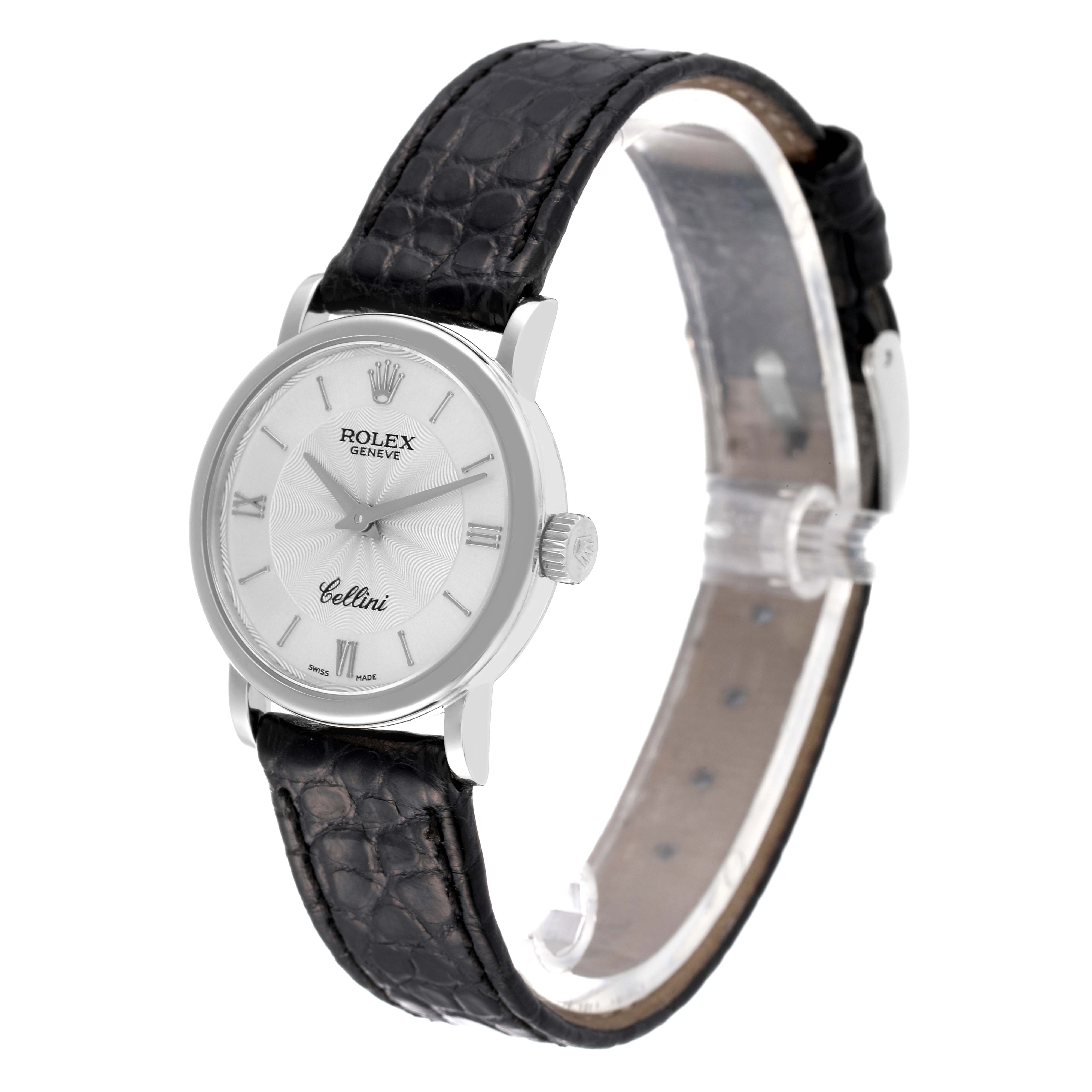 The image shows a Rolex Cellini 6110 Women's White Gold Silver Dial 6110 Women's White Gold Silver Dial watch at a slight angle, displaying its face, leather strap, and side crown.