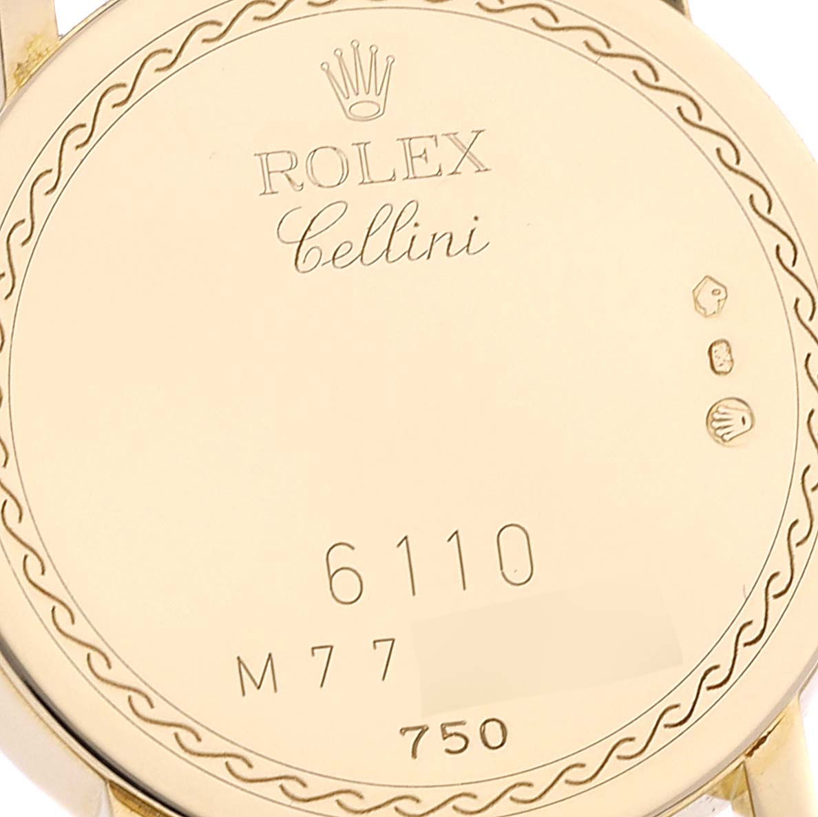 The image shows the back case of a Rolex Cellini 6110 Women's Yellow Gold Black Dial 6110 Women's Yellow Gold Black Dial watch, featuring the model number 6110 and various hallmarks.