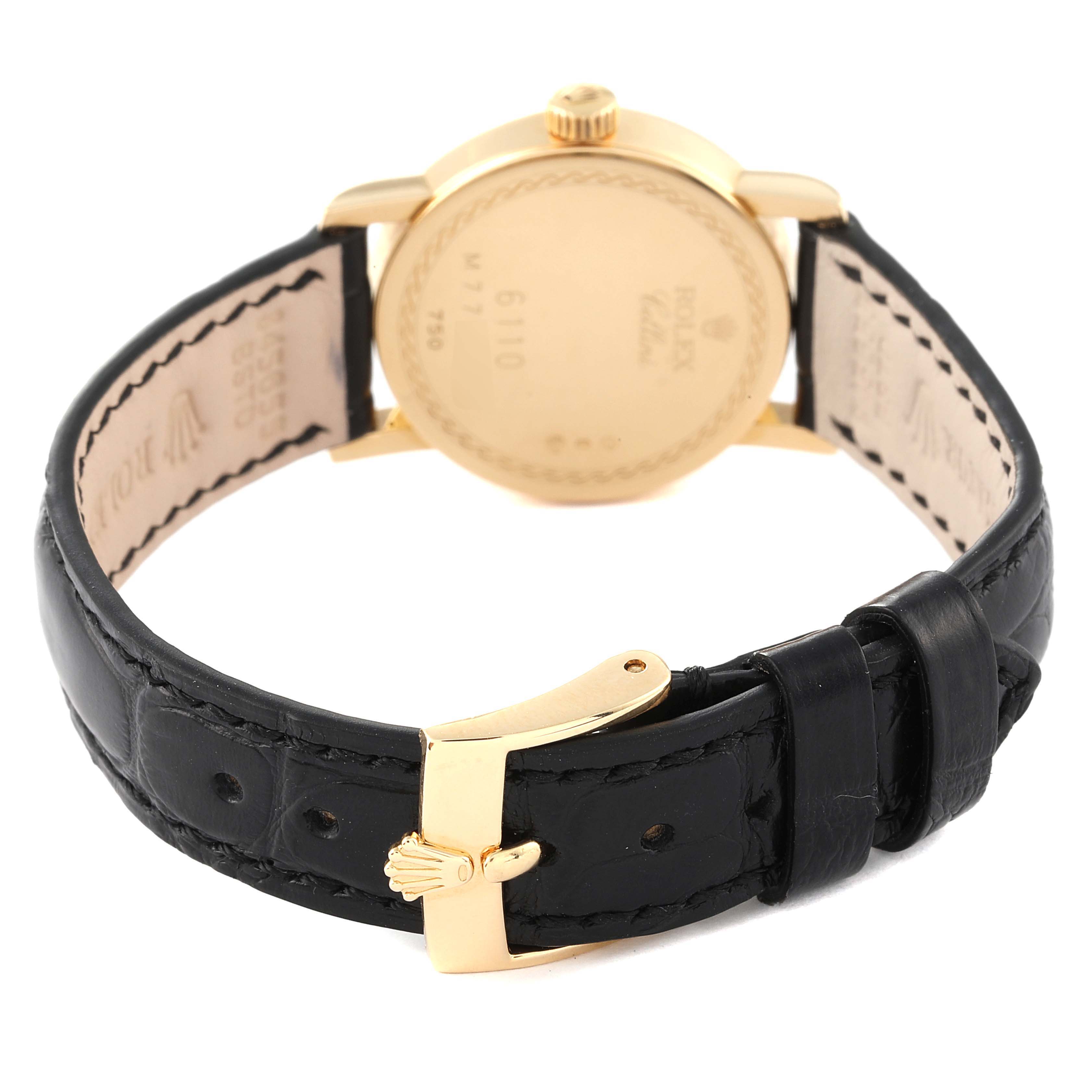 The Rolex Cellini 6110 Women's Yellow Gold Black Dial 6110 Women's Yellow Gold Black Dial watch is shown from the rear angle, highlighting its back case, black leather strap, and gold buckle.