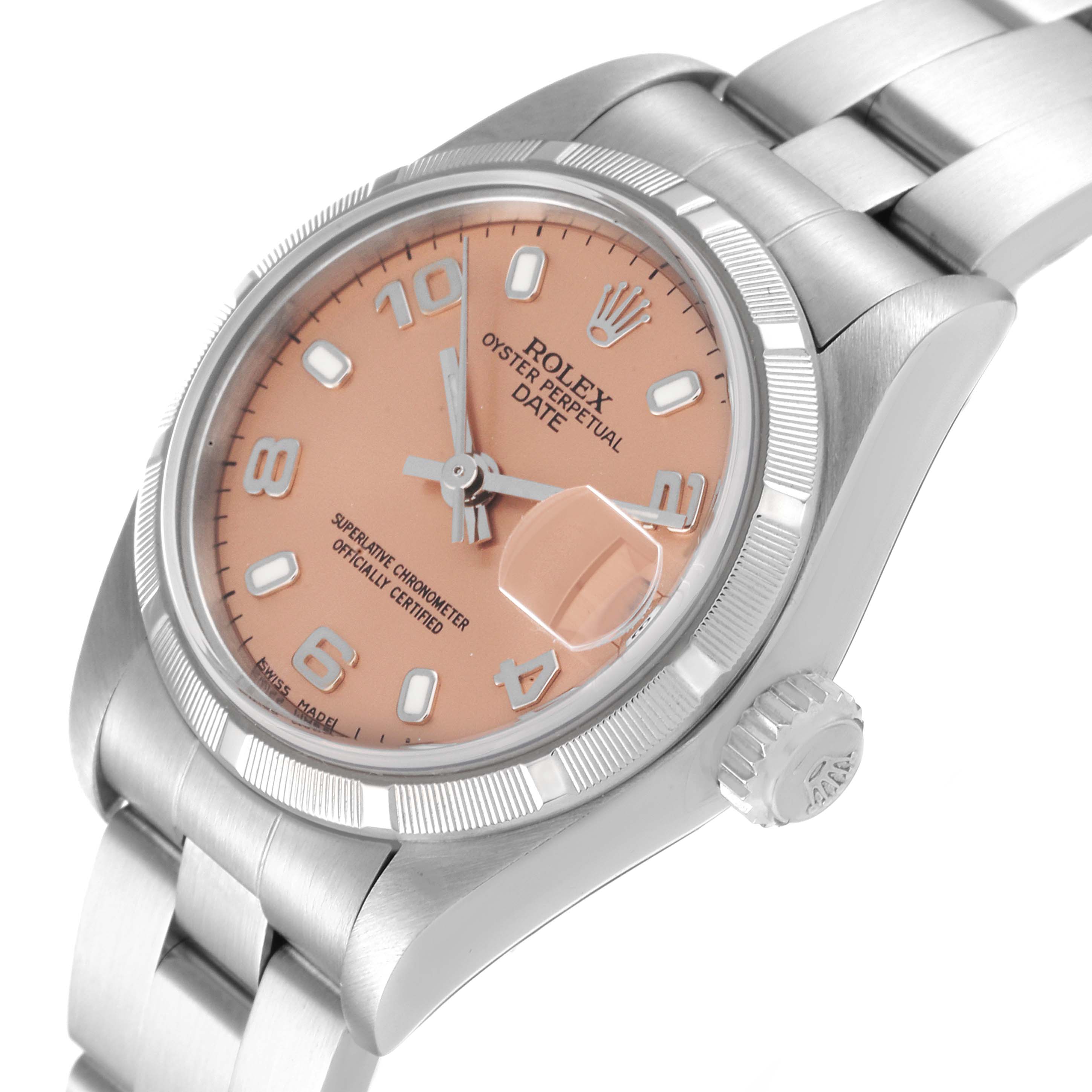 The image shows a Rolex Date 79190 Women
s Stainless Steel Pink Dial 79190 Women
s Stainless Steel Pink Dial model watch from a slight side angle, displaying the dial, crown, and part of the bracelet.