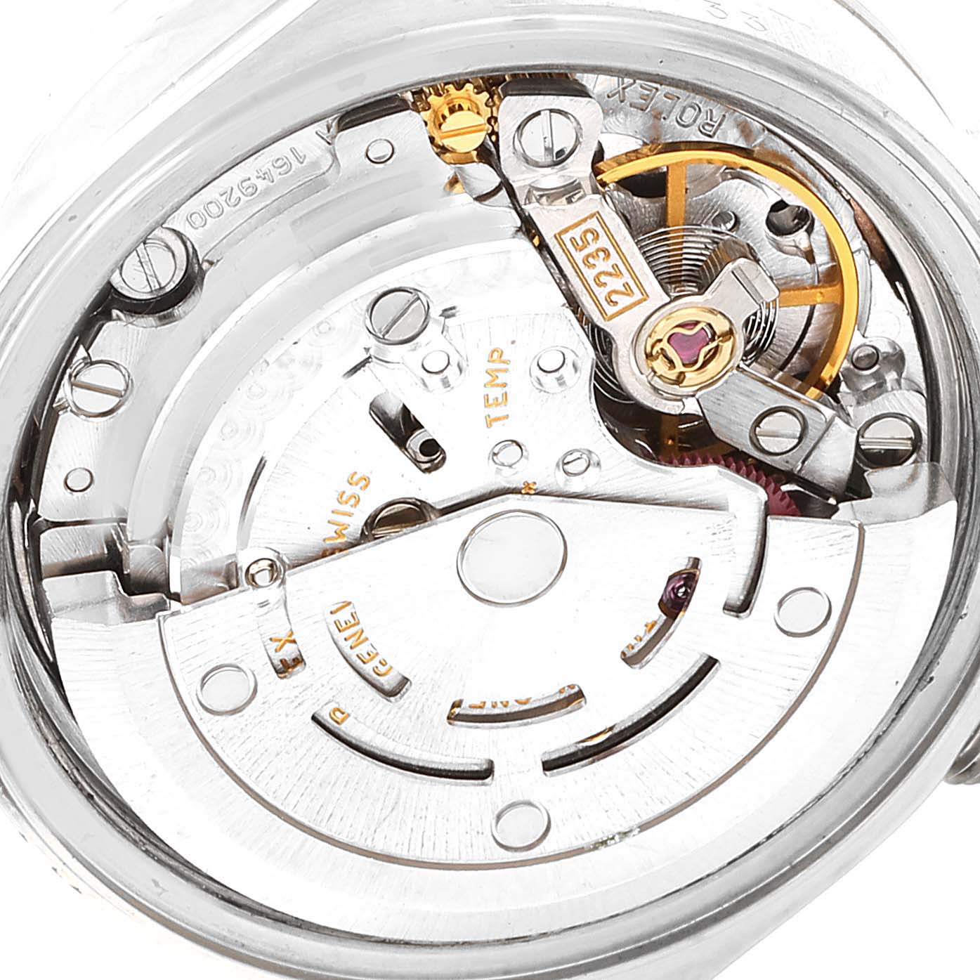 This is a close-up view of the movement from a Rolex Date 79190 Women's Stainless Steel Pink Dial 79190 Women's Stainless Steel Pink Dial model watch, showing the intricate internal gears and components.