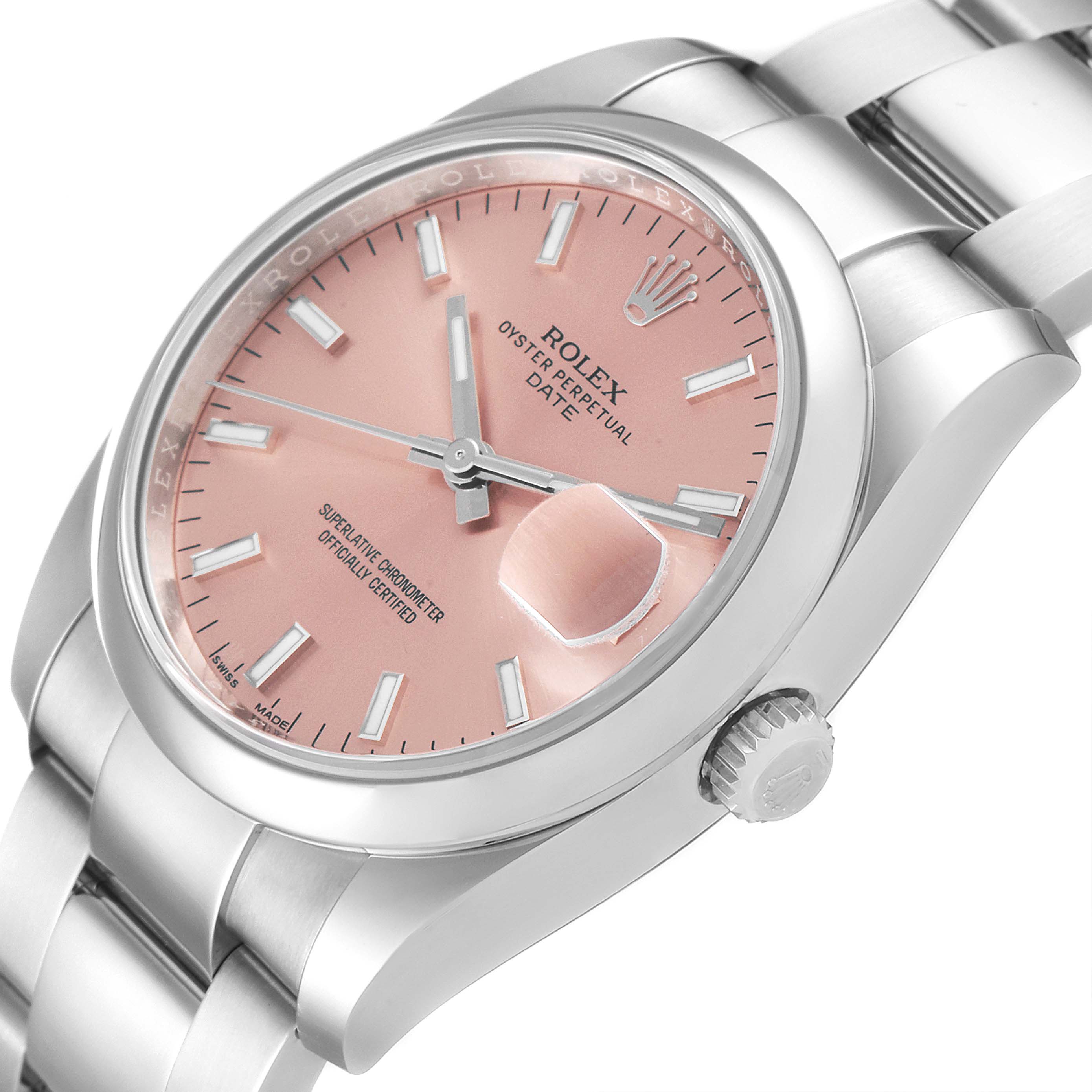 The image shows a Rolex Date 115200 Men's Stainless Steel Pink Dial 115200 Men's Stainless Steel Pink Dial model watch at an angled top-down view, highlighting its pink dial, bezel, bracelet, and crown.