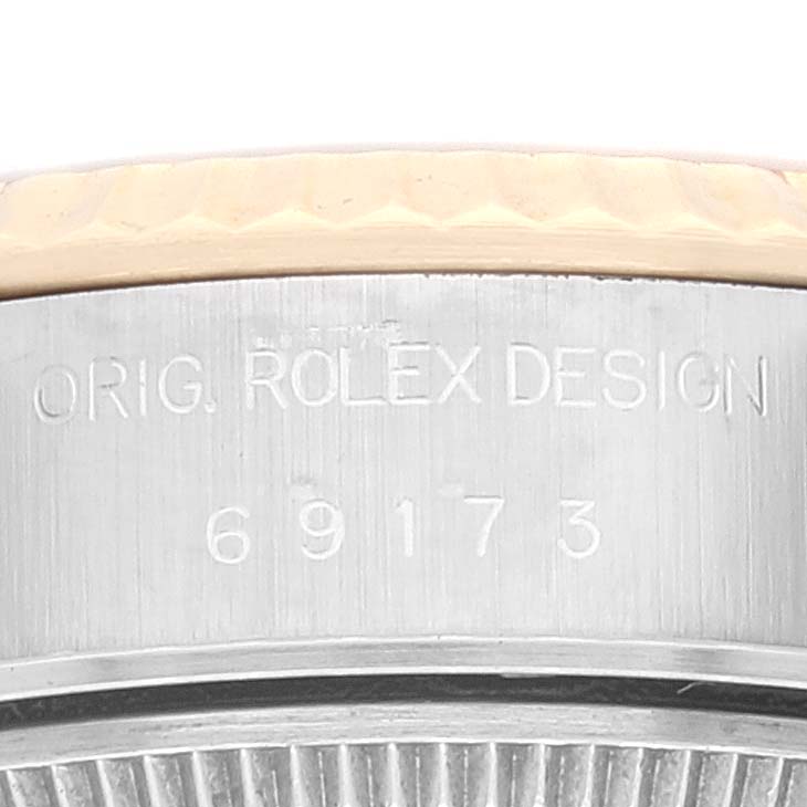 This image shows the side of a Rolex Datejust 69173 Women's Steel and Gold (two tone) Champagne Dial 69173 Women's Steel and Gold (two tone) Champagne Dial watch case, indicating the original design and model number 69173.