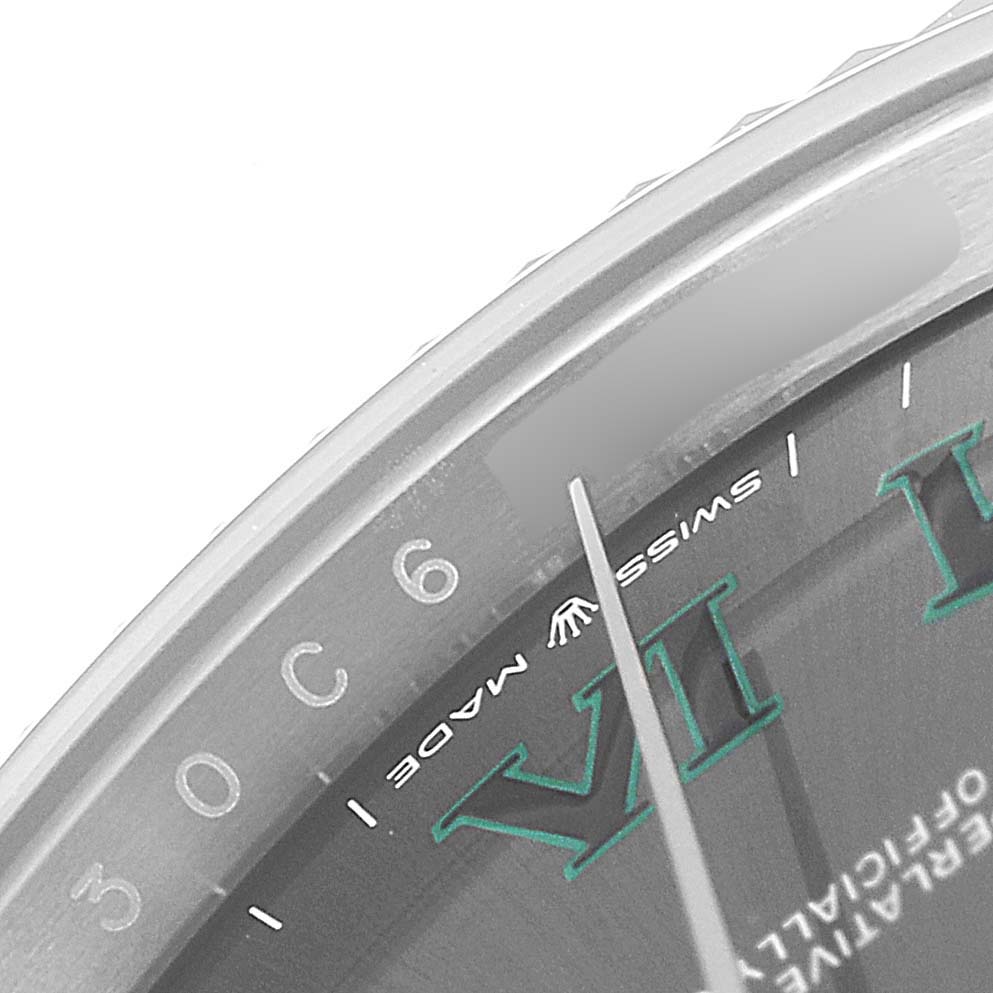 The image shows a close-up of the Rolex Datejust 41 126334 Men
s Stainless Steel Grey Dial 126334 Men
s Stainless Steel Grey Dial dial, focusing on the edge near the six o
clock marker and the "Swiss Made" text.