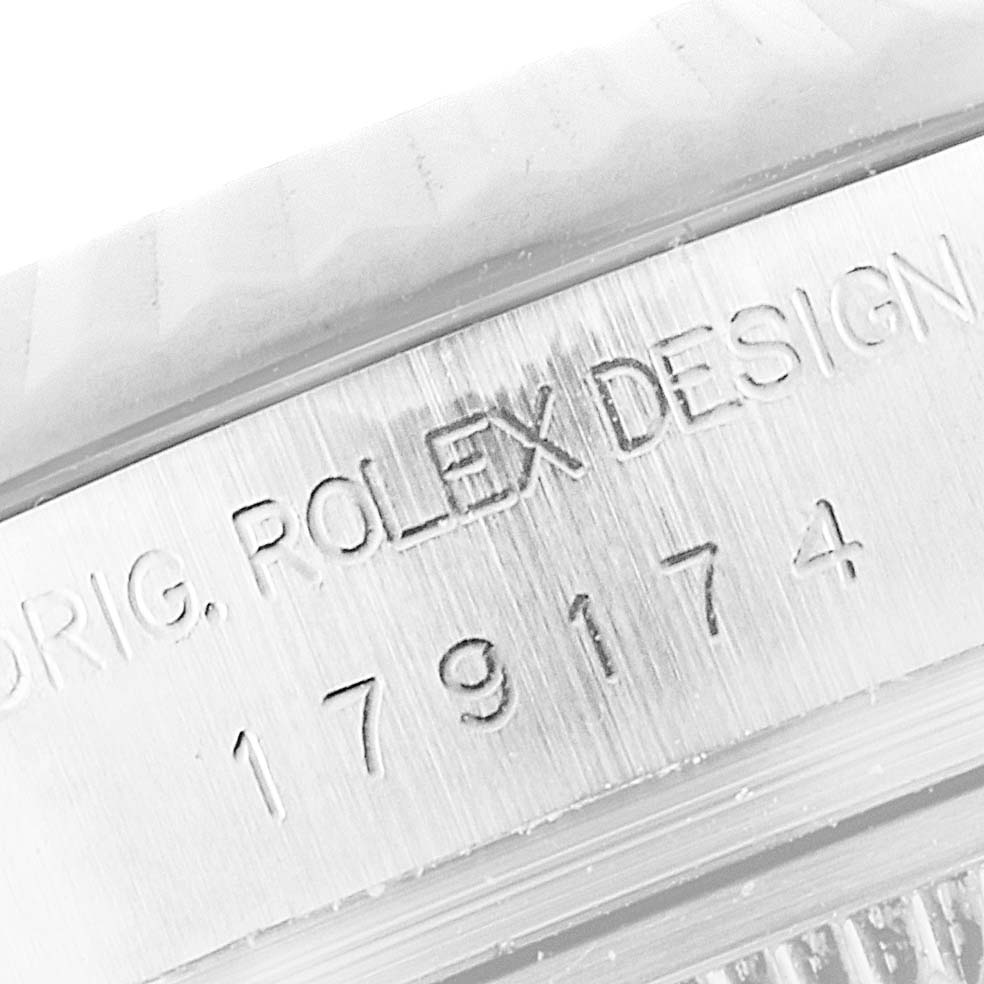 The image shows a close-up of the reference number and "Rolex" engraving on the case side of a Rolex Datejust 179174 Women
s Stainless Steel Mother of Pearl Dial 179174 Women
s Stainless Steel Mother of Pearl Dial watch.