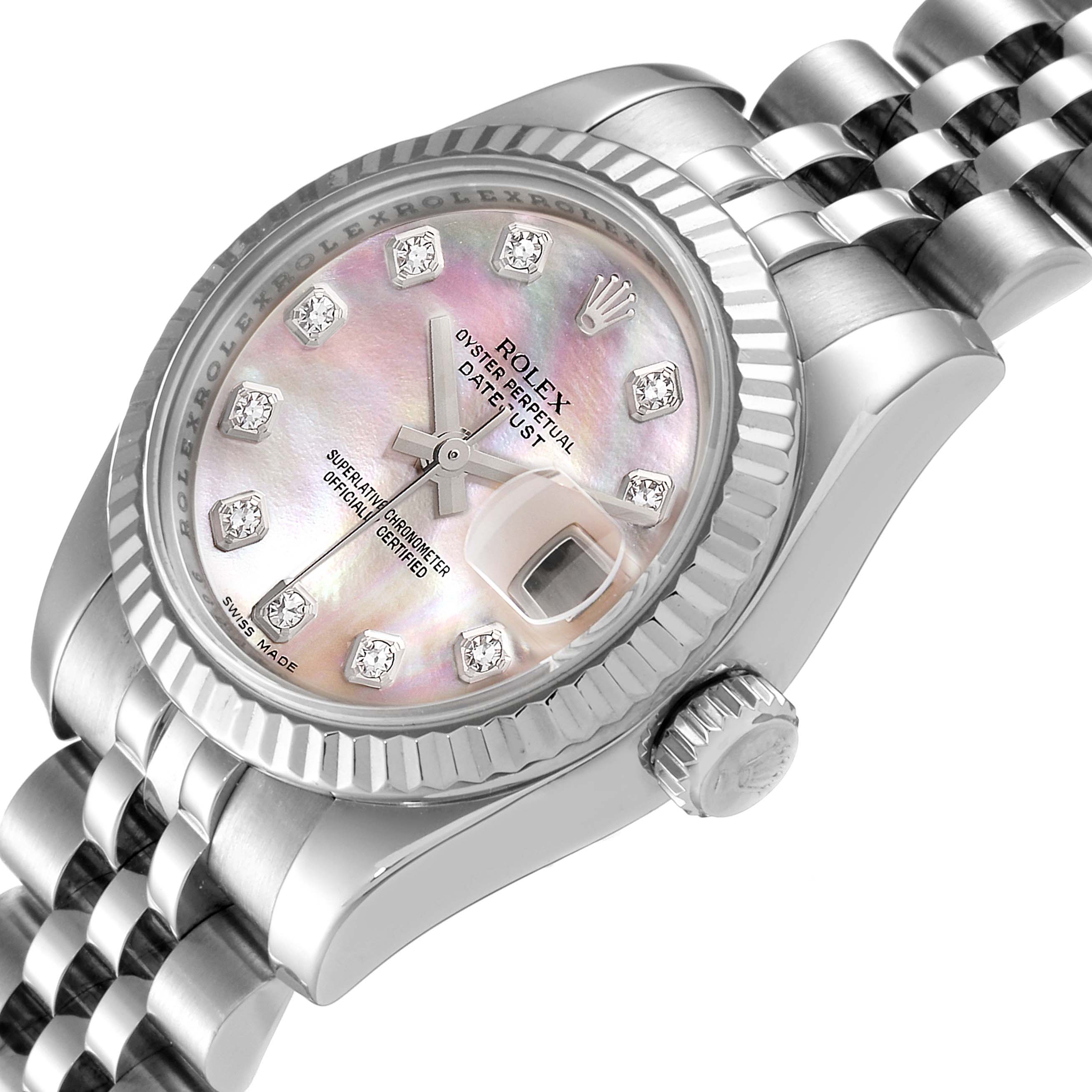 The image shows a close-up of the Rolex Datejust 179174 Women
s Stainless Steel Mother of Pearl Dial 179174 Women
s Stainless Steel Mother of Pearl Dial model watch from an angled side view, highlighting the dial, casing, and bracelet.