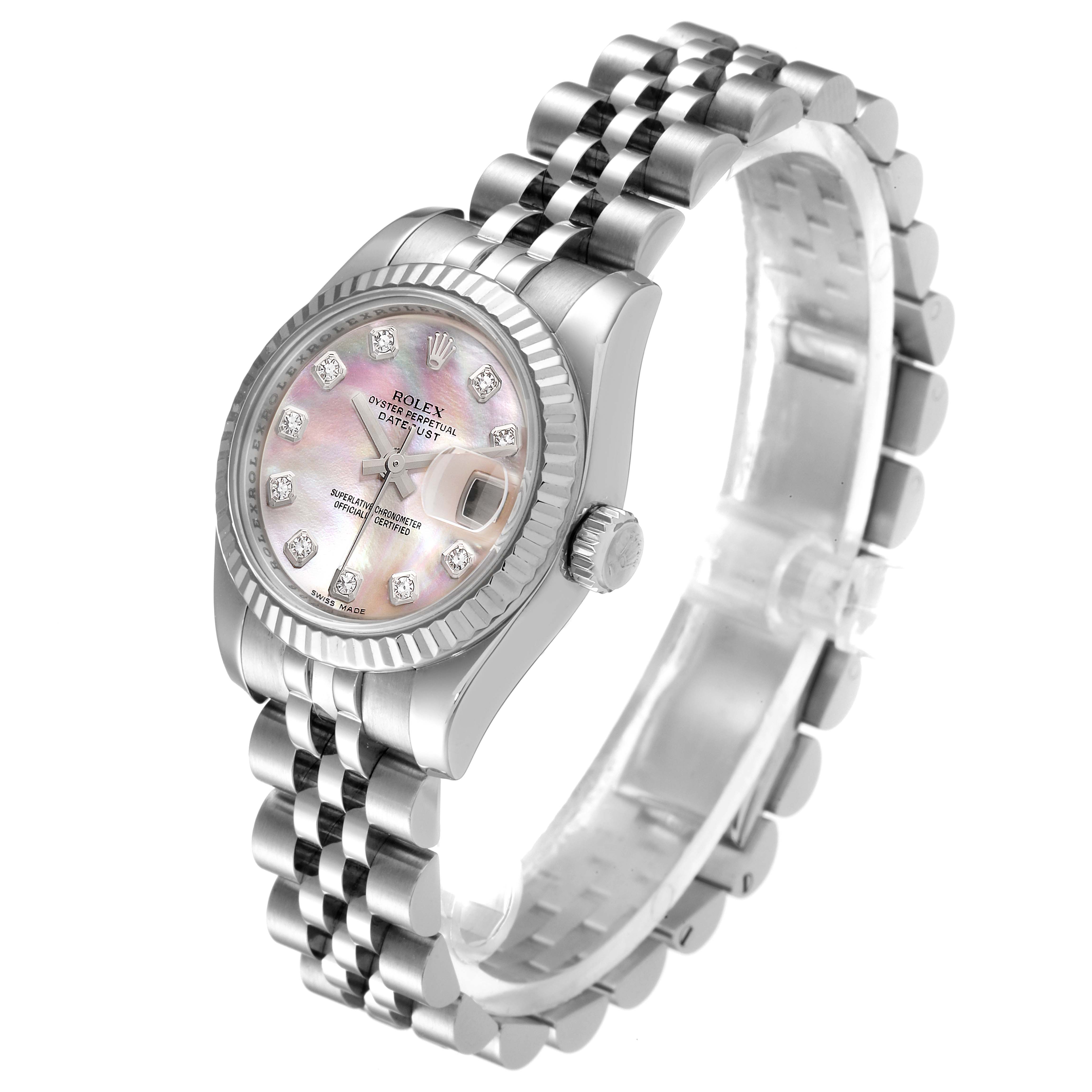 The image shows a Rolex Datejust 179174 Women
s Stainless Steel Mother of Pearl Dial 179174 Women
s Stainless Steel Mother of Pearl Dial watch at an angled view highlighting the dial, bezel, crown, and bracelet.