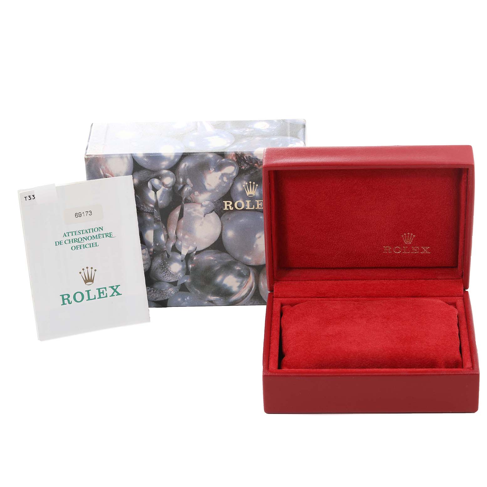 The image shows the packaging and accessories for the Rolex Datejust 69173 Women's Steel and Gold (two tone) Champagne Dial 69173 Women's Steel and Gold (two tone) Champagne Dial, including the box, booklet, and inner cushion.