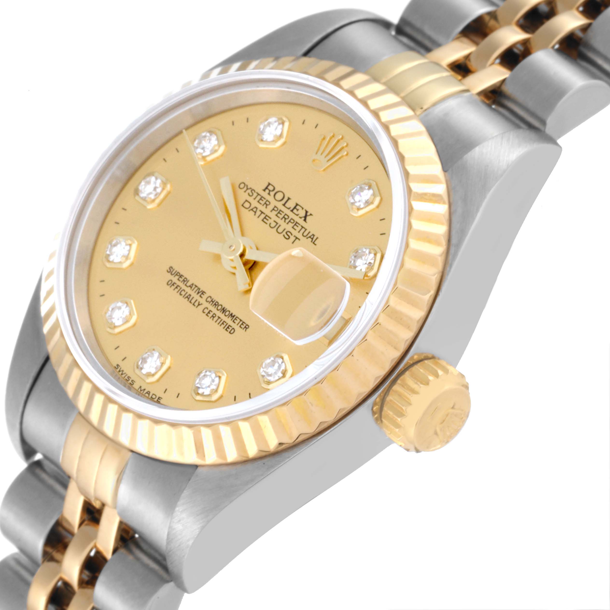 This image shows a close-up, angled view of a Rolex Datejust 69173 Women's Steel and Gold (two tone) Champagne Dial 69173 Women's Steel and Gold (two tone) Champagne Dial watch highlighting the dial, bezel, crown, and part of the bracelet.