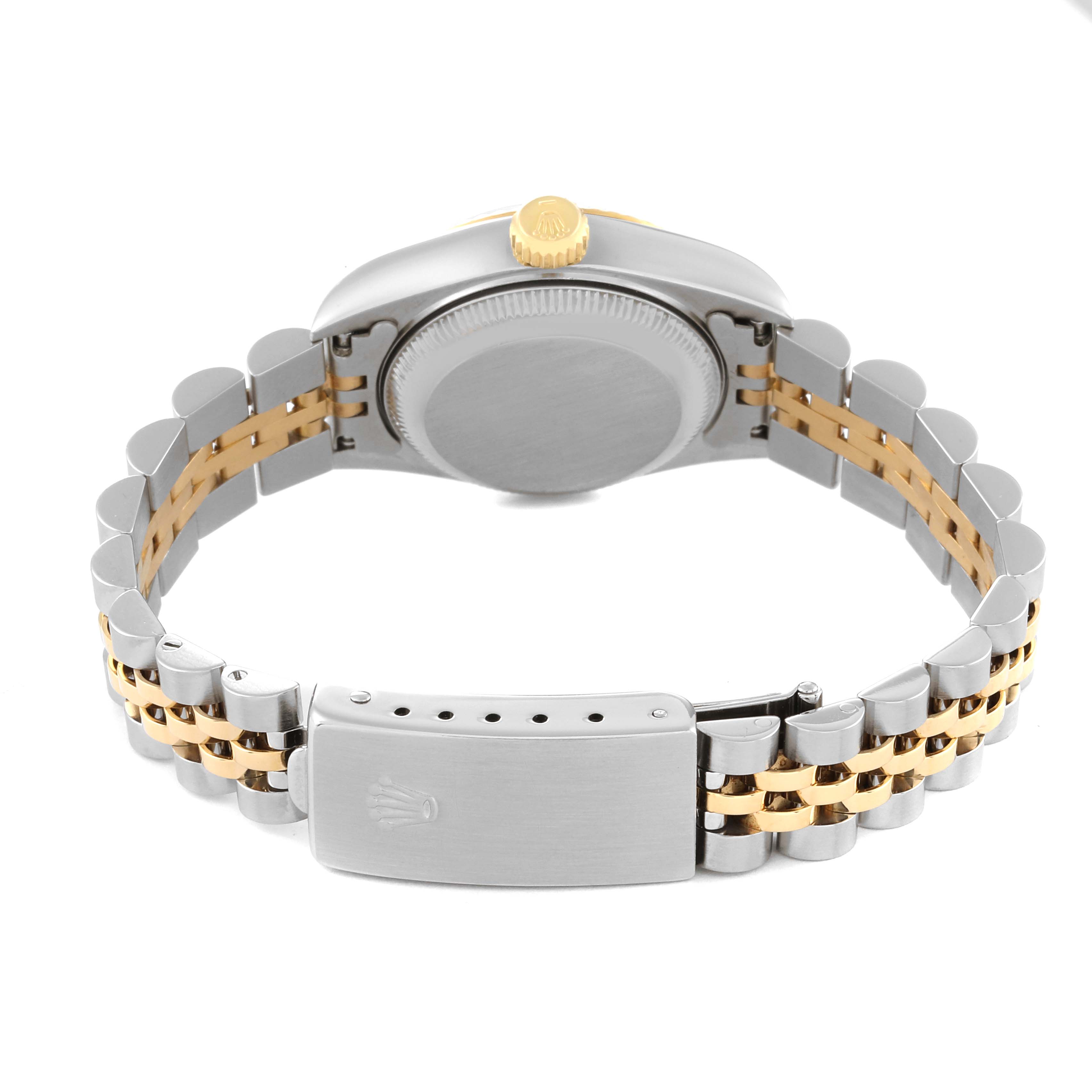 This image shows a back view of a Rolex Datejust 69173 Women's Steel and Gold (two tone) Champagne Dial 69173 Women's Steel and Gold (two tone) Champagne Dial watch, featuring its case back, crown, and two-tone Jubilee bracelet.