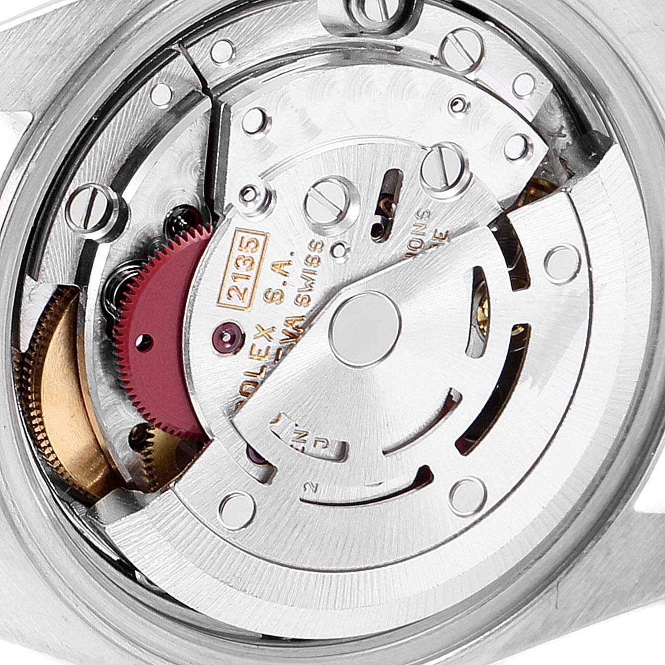 This is a close-up view of the internal movement mechanism of a Rolex Datejust 69173 Women's Steel and Gold (two tone) Champagne Dial 69173 Women's Steel and Gold (two tone) Champagne Dial watch.