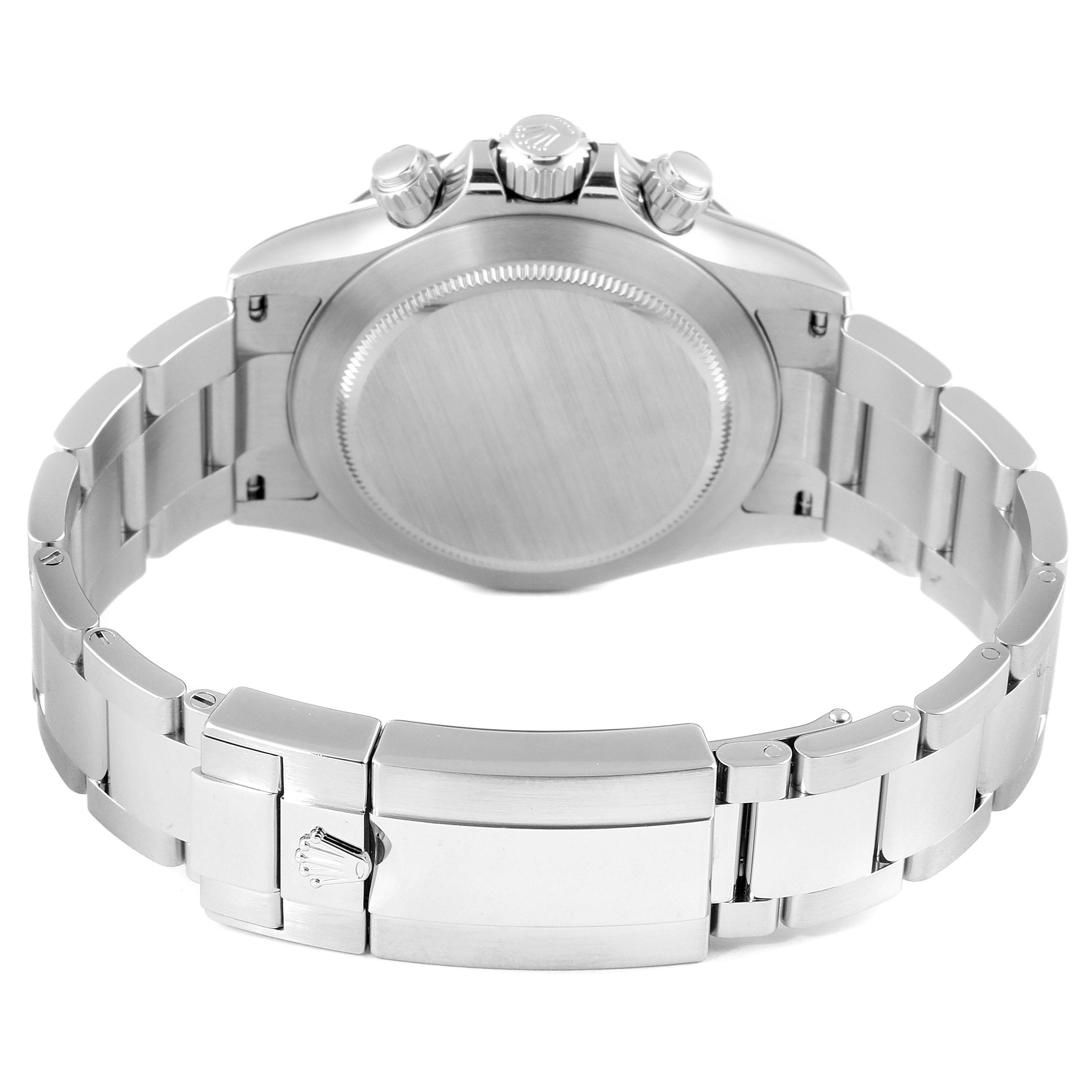 The image shows the back view of a Rolex Daytona 116500 Men's Stainless Steel White Dial 116500 Men's Stainless Steel White Dial watch, highlighting the case back, bracelet, and clasp with the Rolex logo.