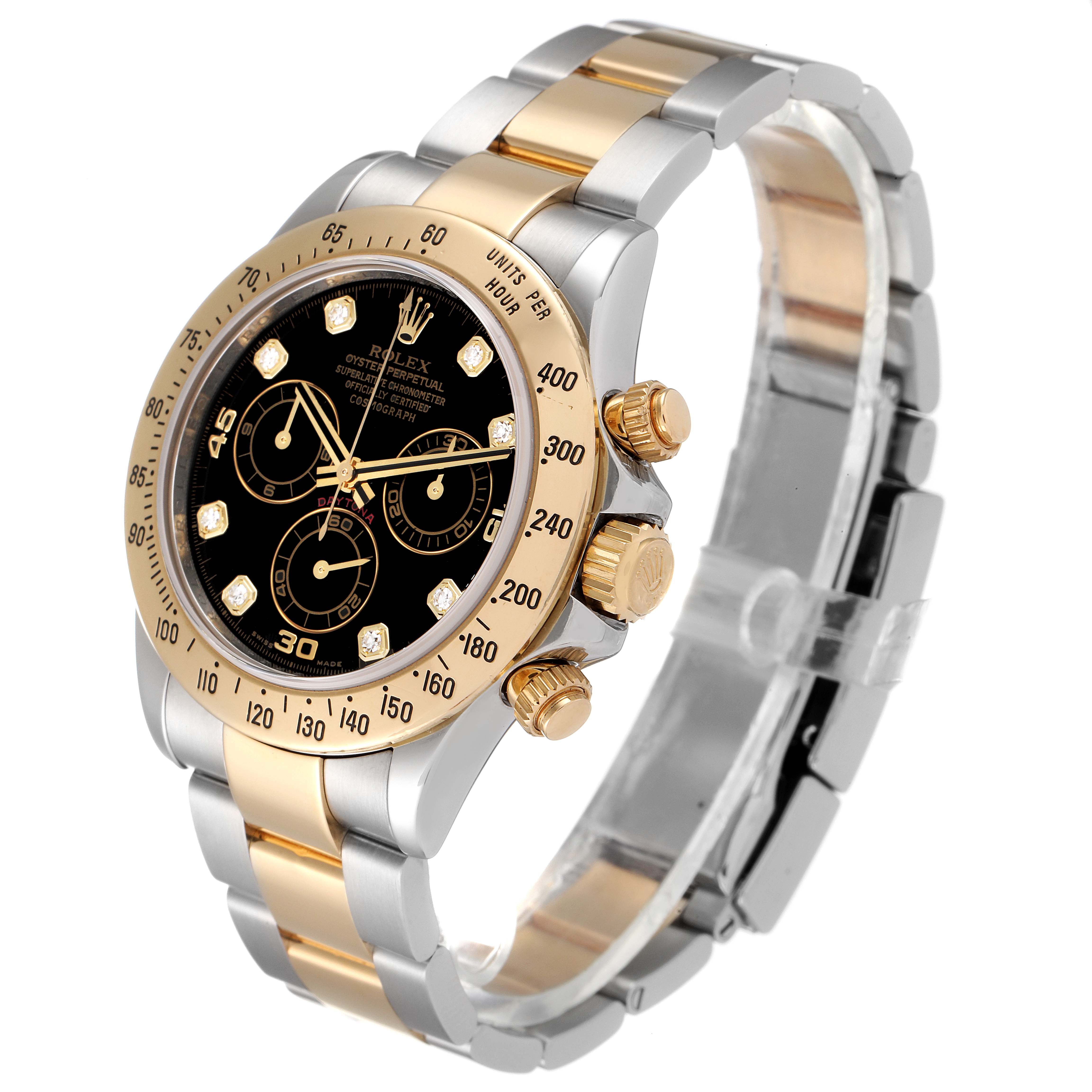 This image shows a side and front angle of a Rolex Daytona 116523 Men
s Steel and Gold (two tone) Black Dial 116523 Men
s Steel and Gold (two tone) Black Dial watch, highlighting its dial, bezel, pushers, and bracelet.
