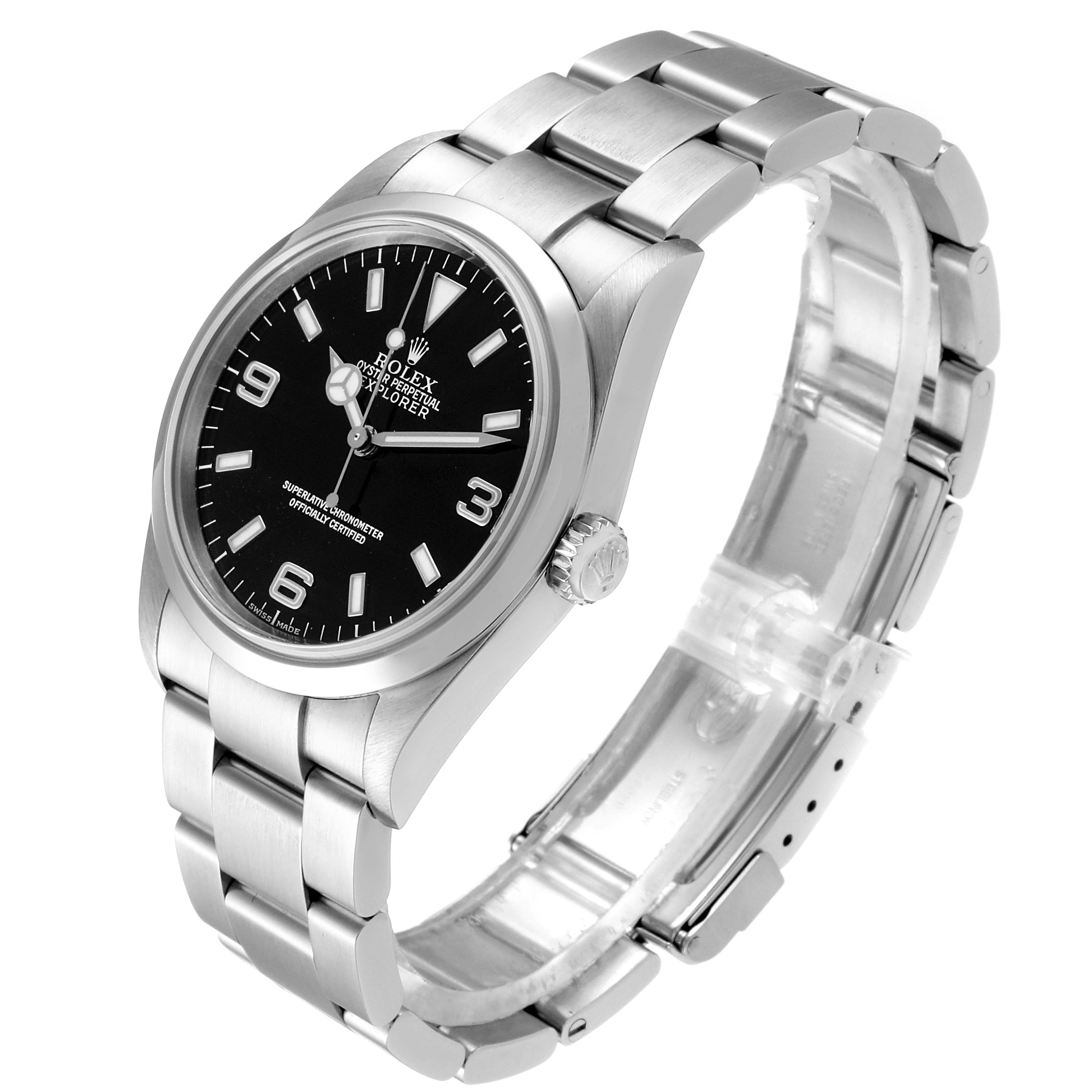 The Rolex Explorer 114270 Men
s Stainless Steel Black Dial 114270 Men
s Stainless Steel Black Dial watch is shown at a slight angle, highlighting the black dial, bezel, and metal bracelet.