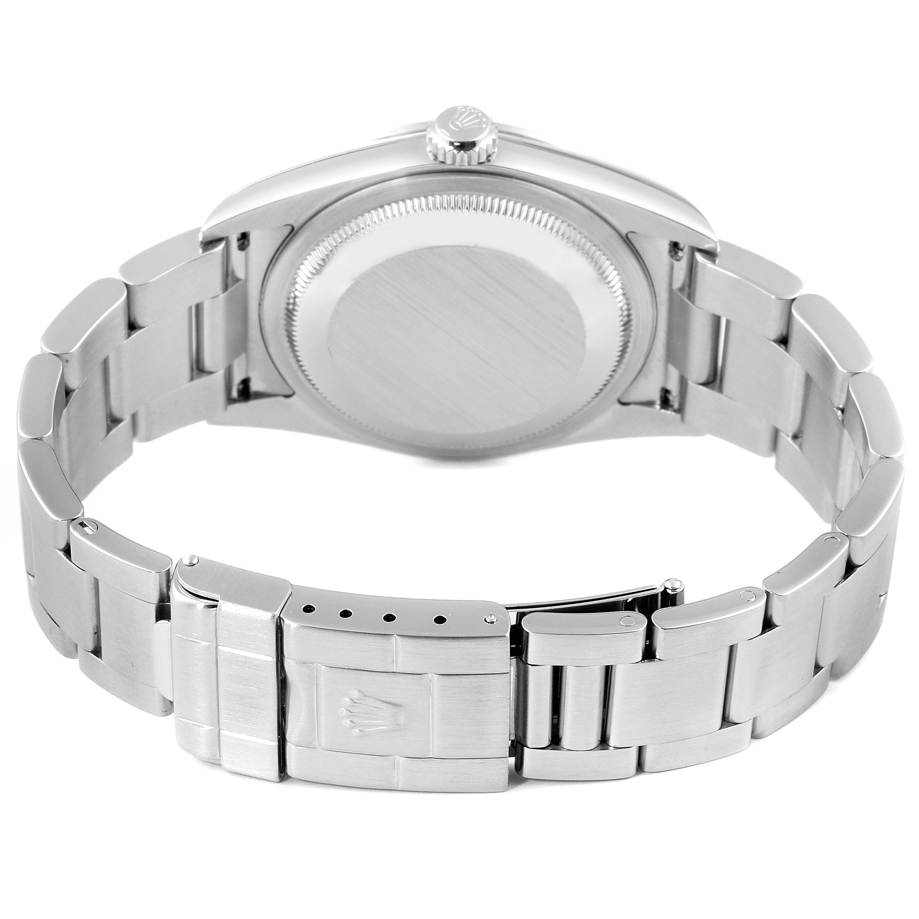 The image shows the back of the Rolex Explorer 114270 Men
s Stainless Steel Black Dial 114270 Men
s Stainless Steel Black Dial watch with its bracelet and clasp visible.