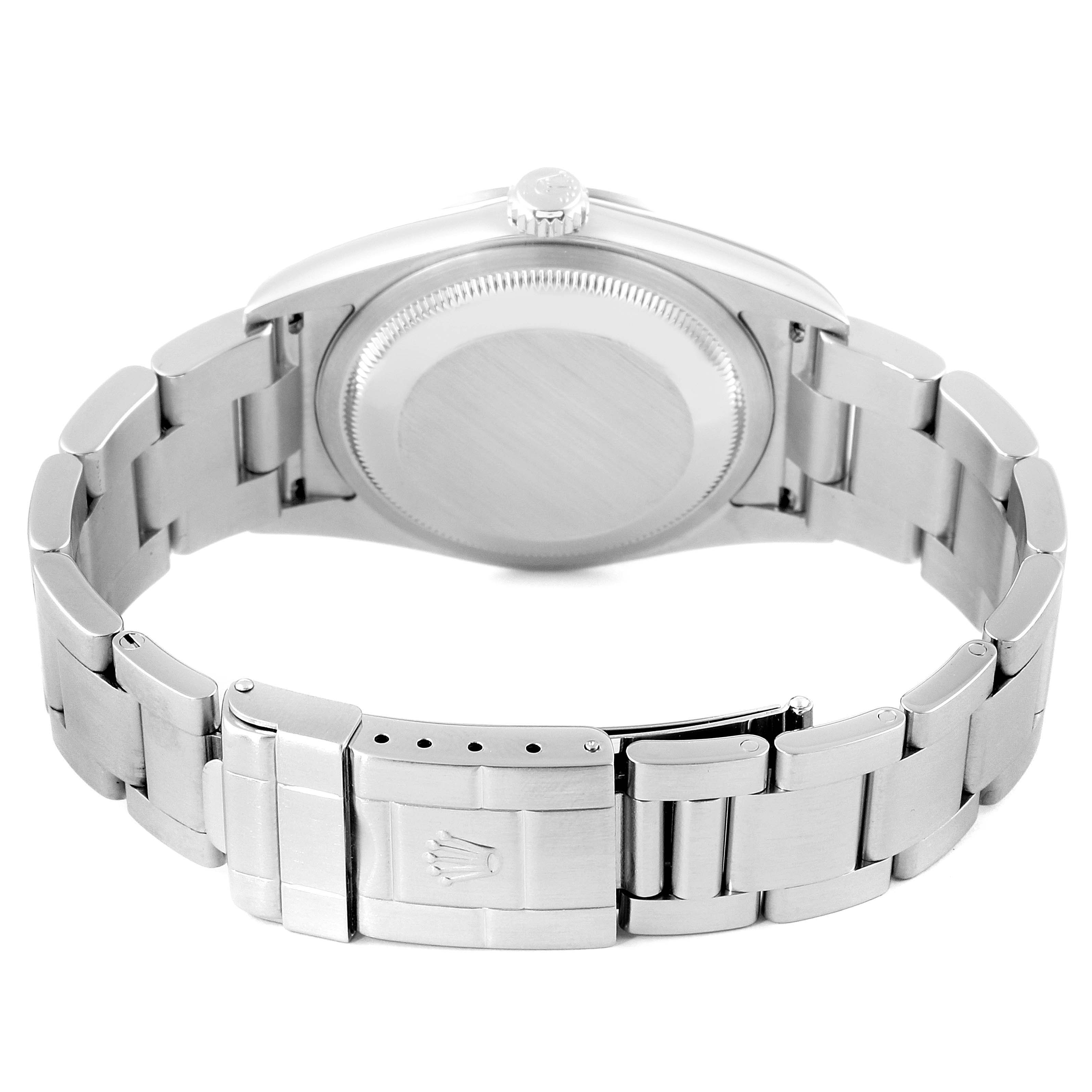 The image shows the back view of a Rolex Explorer 114270 Men's Stainless Steel Black Dial 114270 Men's Stainless Steel Black Dial watch, highlighting the case back and stainless steel bracelet with the clasp open.