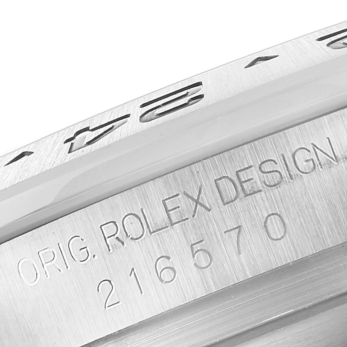This image shows a close-up of the side of a Rolex Explorer 216570 Men
s Stainless Steel Black Dial 216570 Men
s Stainless Steel Black Dial watch, highlighting the engraved model number and "ROLEX DESIGN" text.