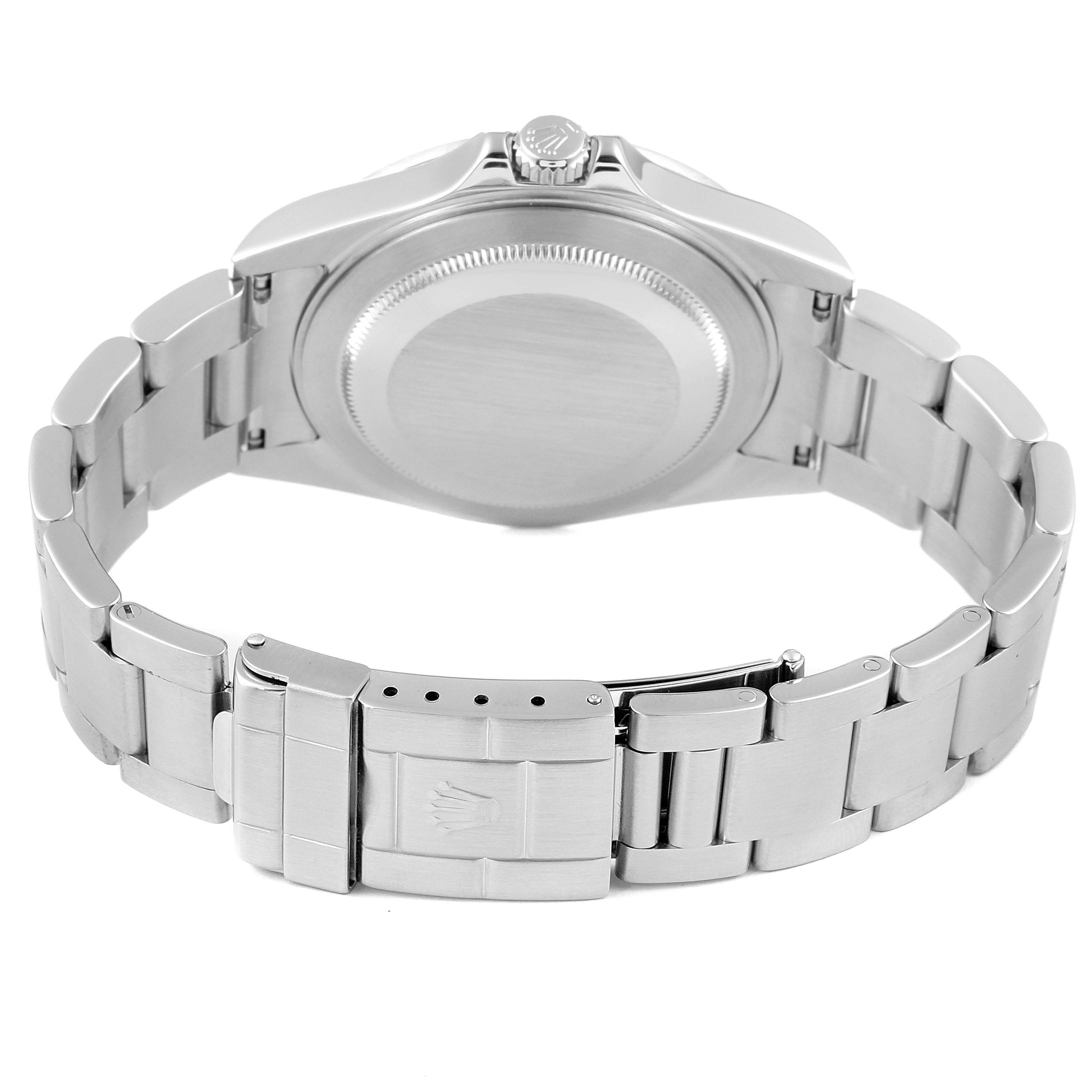 This image shows the back and clasp of a Rolex Explorer 16570 Men
s Stainless Steel White Dial 16570 Men
s Stainless Steel White Dial model watch, highlighting its stainless steel bracelet and engraved case back.