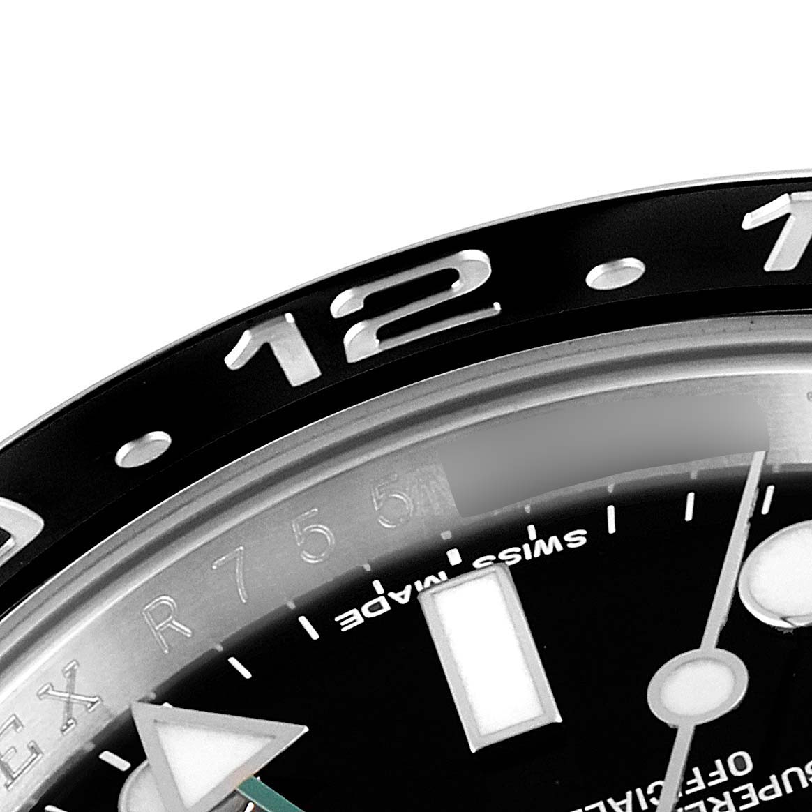 This image shows a close-up of the bezel and part of the dial of a Rolex GMT-Master 116710 Men
s Stainless Steel Black Dial 116710 Men
s Stainless Steel Black Dial watch.