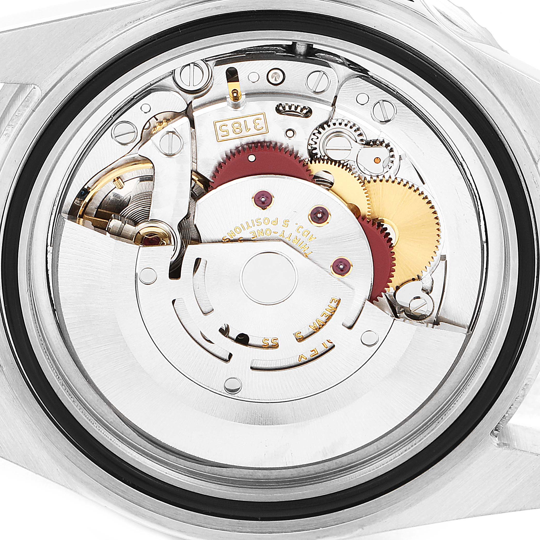 The image shows the intricate movement mechanism of the Rolex GMT-Master 16710 Men
s Stainless Steel Black Dial 16710 Men
s Stainless Steel Black Dial watch from a rear angle.