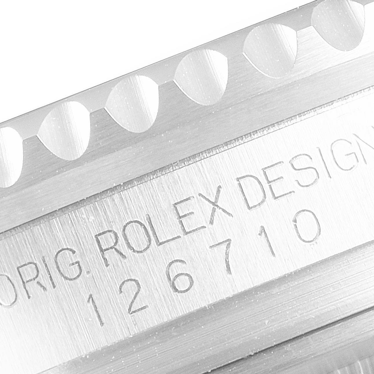 The image shows the side engraving with the model number on the bezel of a Rolex GMT-Master 126710 Men
s Stainless Steel Black Dial 126710 Men
s Stainless Steel Black Dial watch.