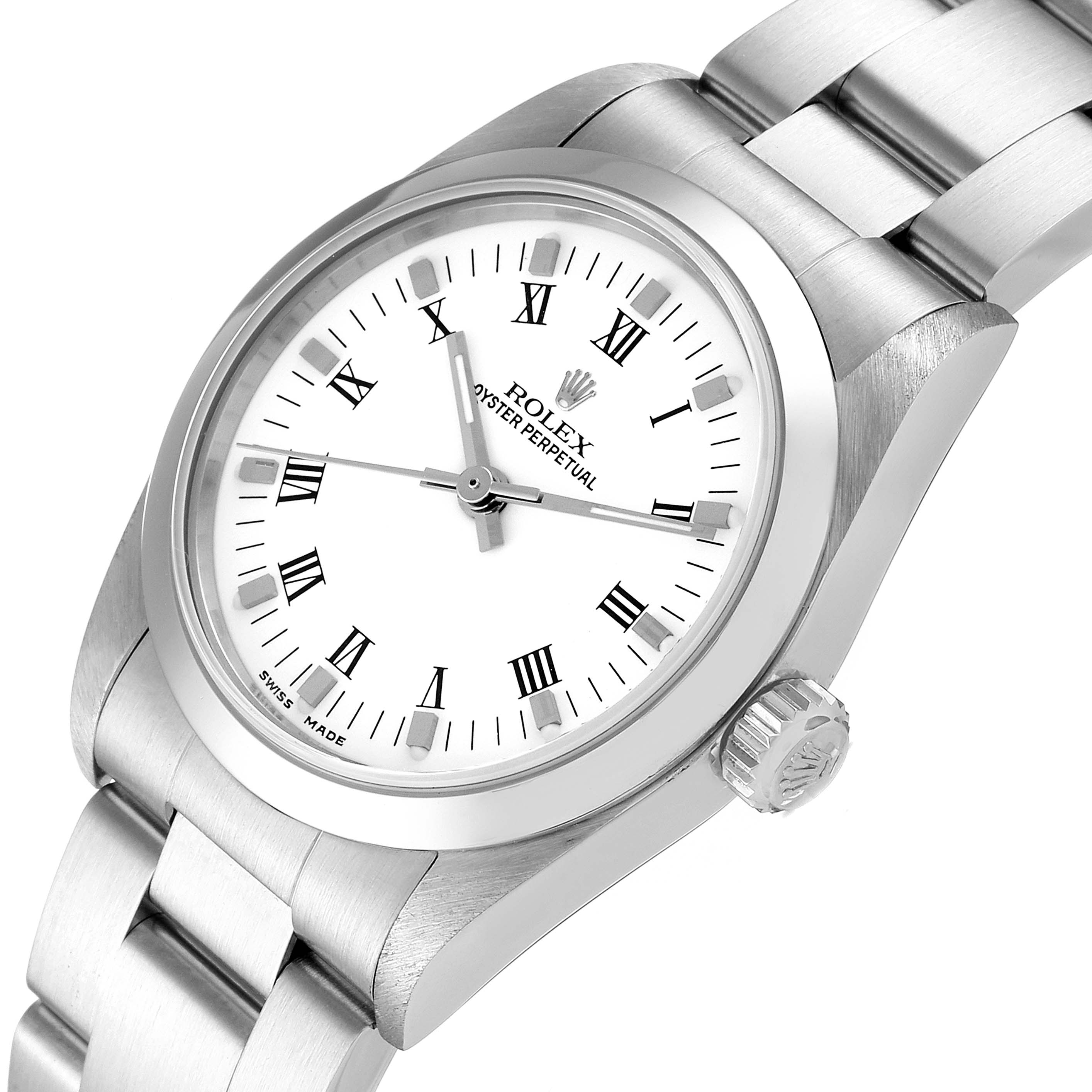 This image shows a close-up of the Rolex Oyster Perpetual Mid-Size watch, focusing on the dial, bezel, crown, and first bracelet links.