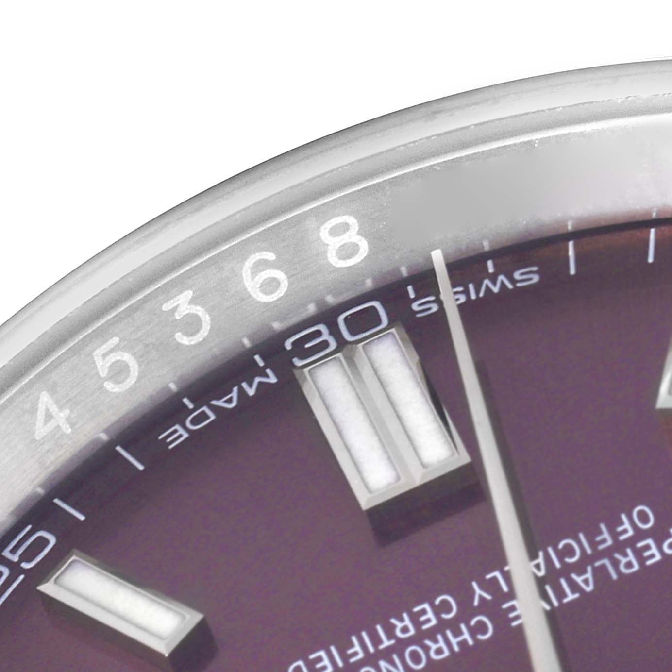 This image shows a close-up view of the dial and bezel section of a Rolex Oyster Perpetual 116000 Men's Stainless Steel Burgundy Dial 116000 Men's Stainless Steel Burgundy Dial watch.