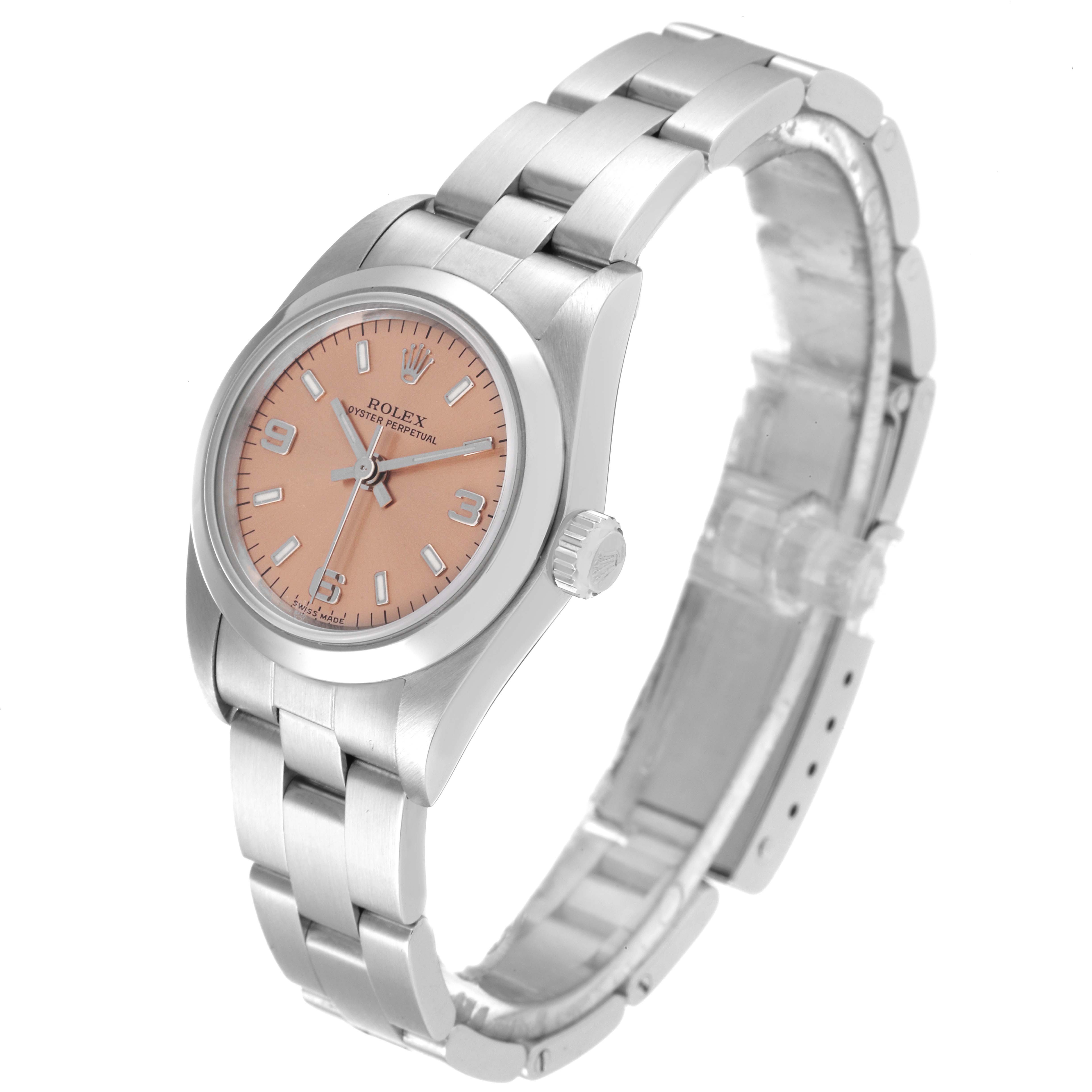 The image shows a side angle of a Rolex Oyster Perpetual 76080 Women
s Stainless Steel Pink Dial 76080 Women
s Stainless Steel Pink Dial watch, displaying its dial, case, crown, and bracelet.