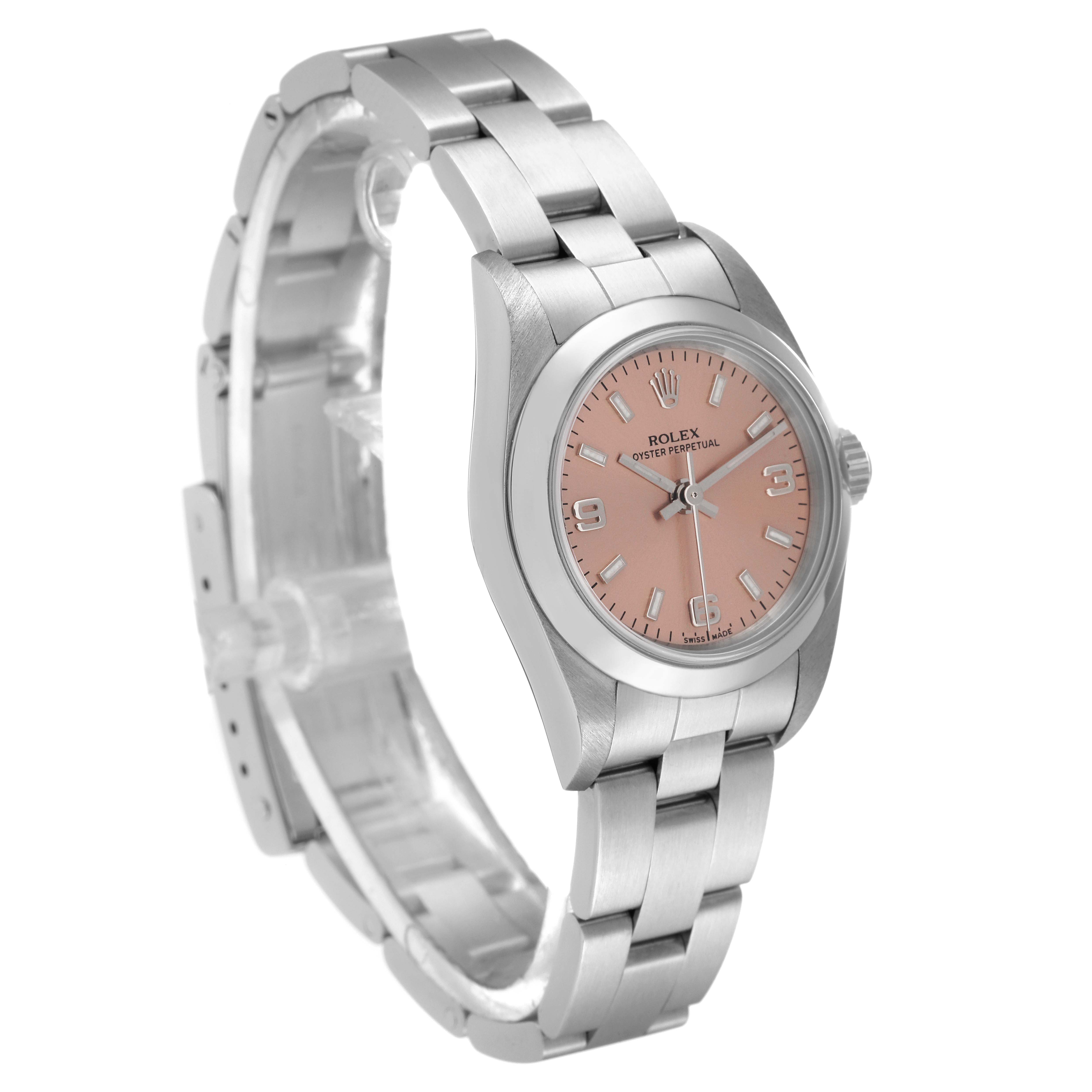 The image shows a Rolex Oyster Perpetual 76080 Women
s Stainless Steel Pink Dial 76080 Women
s Stainless Steel Pink Dial watch at a slight angle, highlighting the face, bezel, and bracelet.