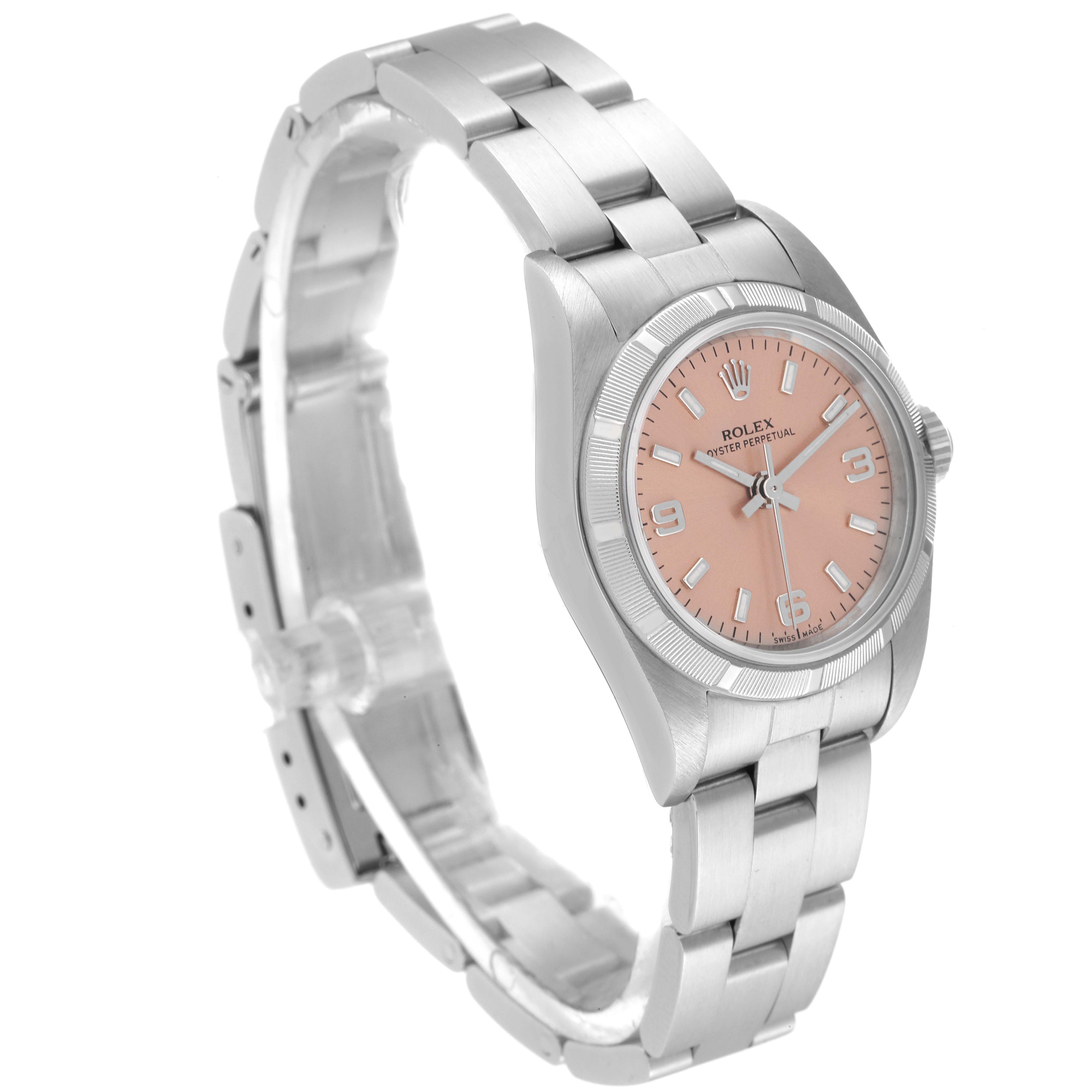 This image shows the Rolex Oyster Perpetual 76030 Women
s Stainless Steel Pink Dial 76030 Women
s Stainless Steel Pink Dial watch at a front-left angle displaying the bracelet, case, and salmon-colored dial.