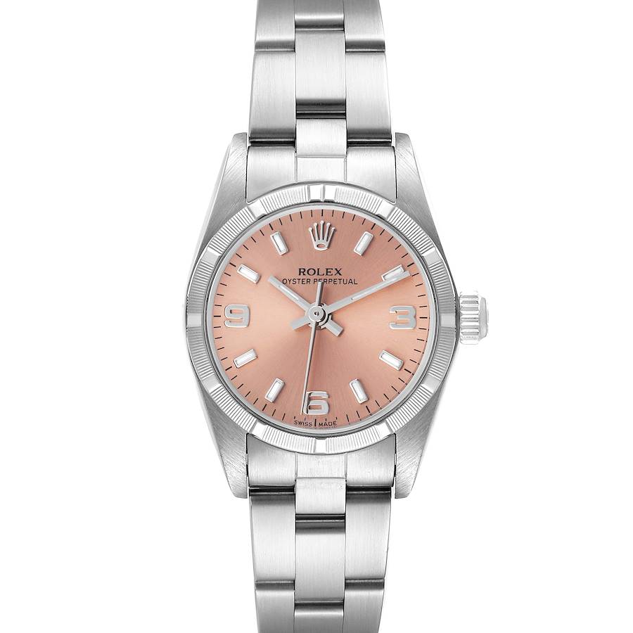 The Rolex Oyster Perpetual watch is shown from the front, displaying its stainless steel band, pink dial, and crown.