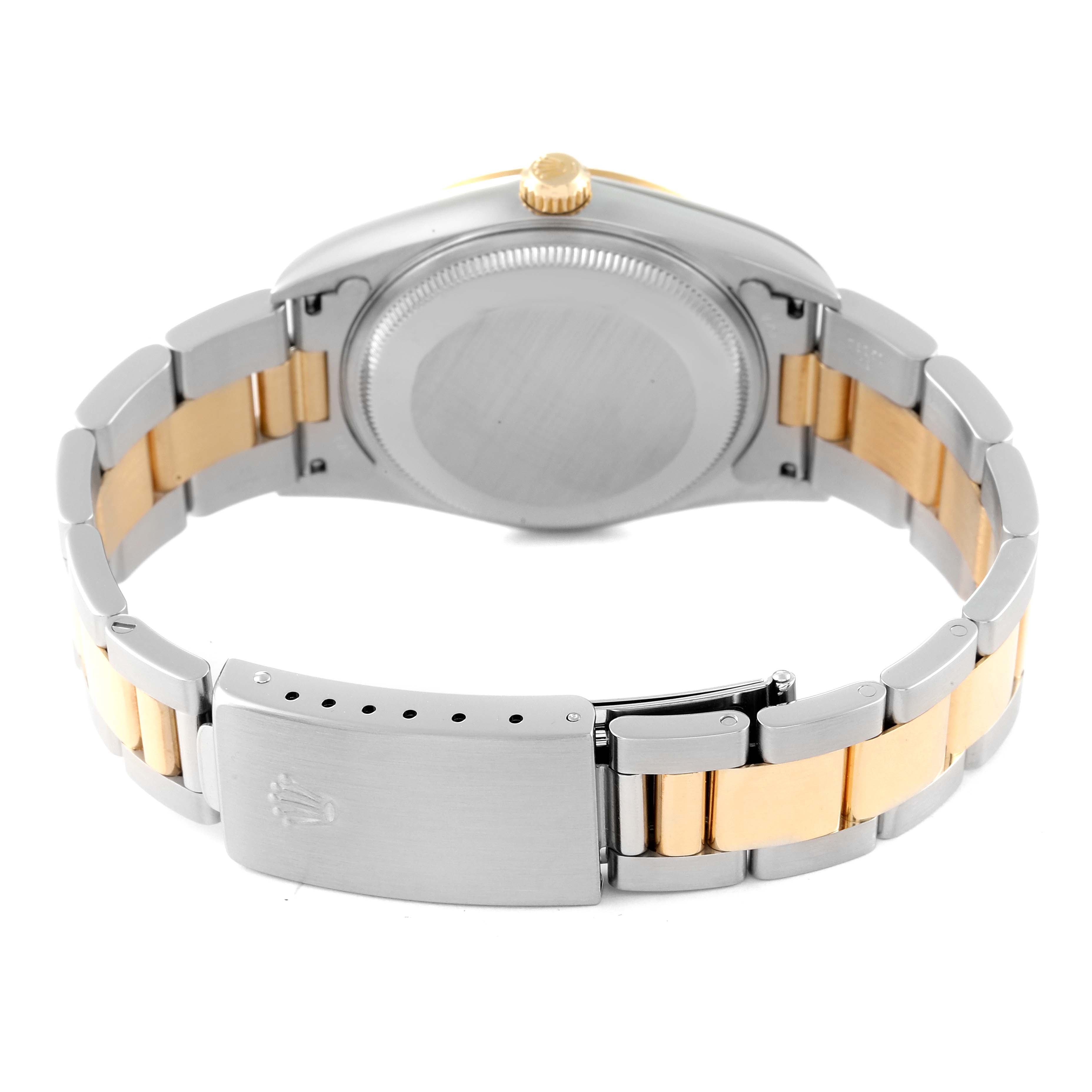This image shows the back case and bracelet of a Rolex Oyster Perpetual 14233 Men's Steel and Gold (two tone) Black Dial 14233 Men's Steel and Gold (two tone) Black Dial watch, highlighting its two-tone design.