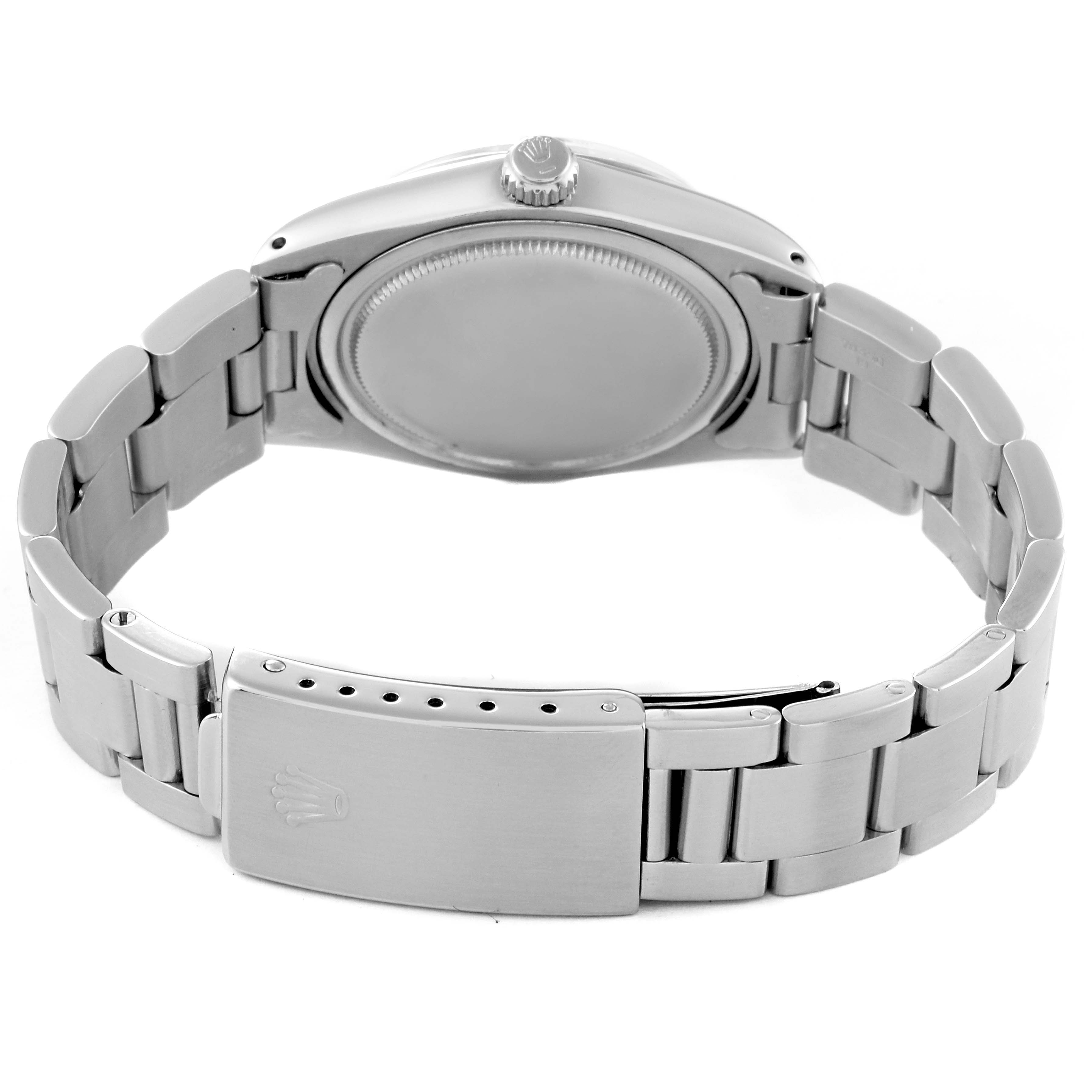 The image shows the backside and clasp of a Rolex Vintage Collection 6694 Men's Stainless Steel Blue Dial 6694 Men's Stainless Steel Blue Dial watch, including its bracelet and case back.