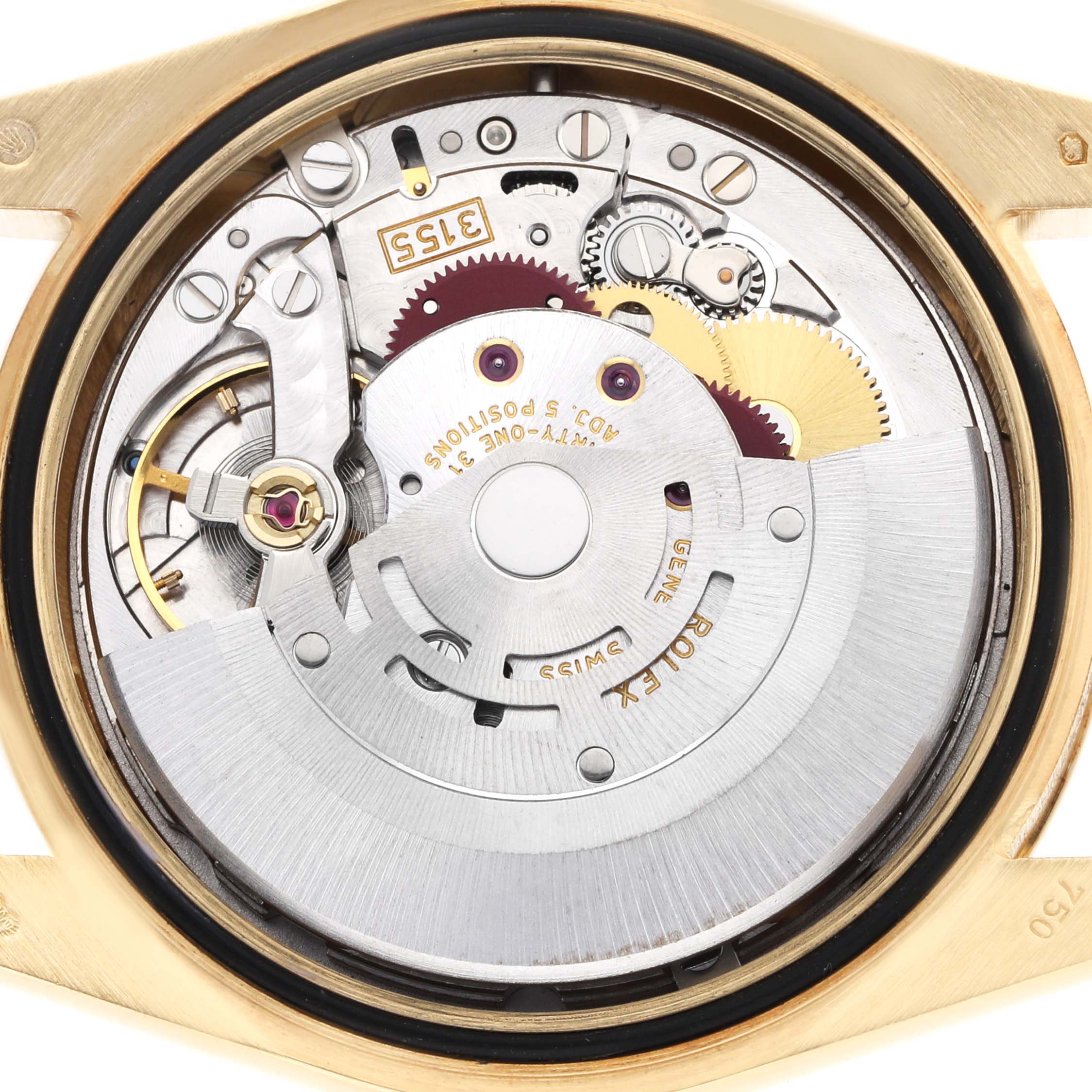 The image shows the back view of the Rolex President 118388 Men's Yellow Gold Green Dial model, revealing its intricate movement and gears.