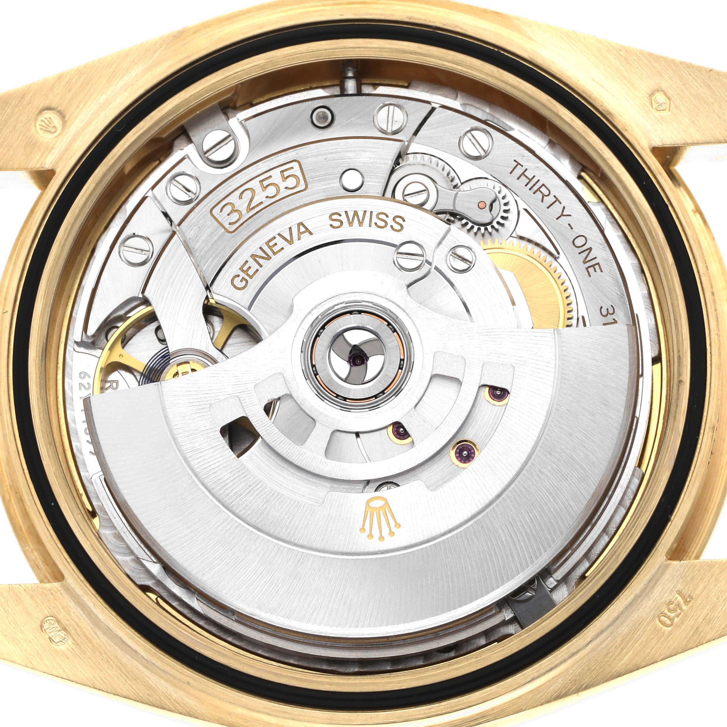 The image shows the intricate movement of a Rolex President 228238 Men's Yellow Gold Champagne Dial model watch from a top-down angle, focusing on its mechanical components.