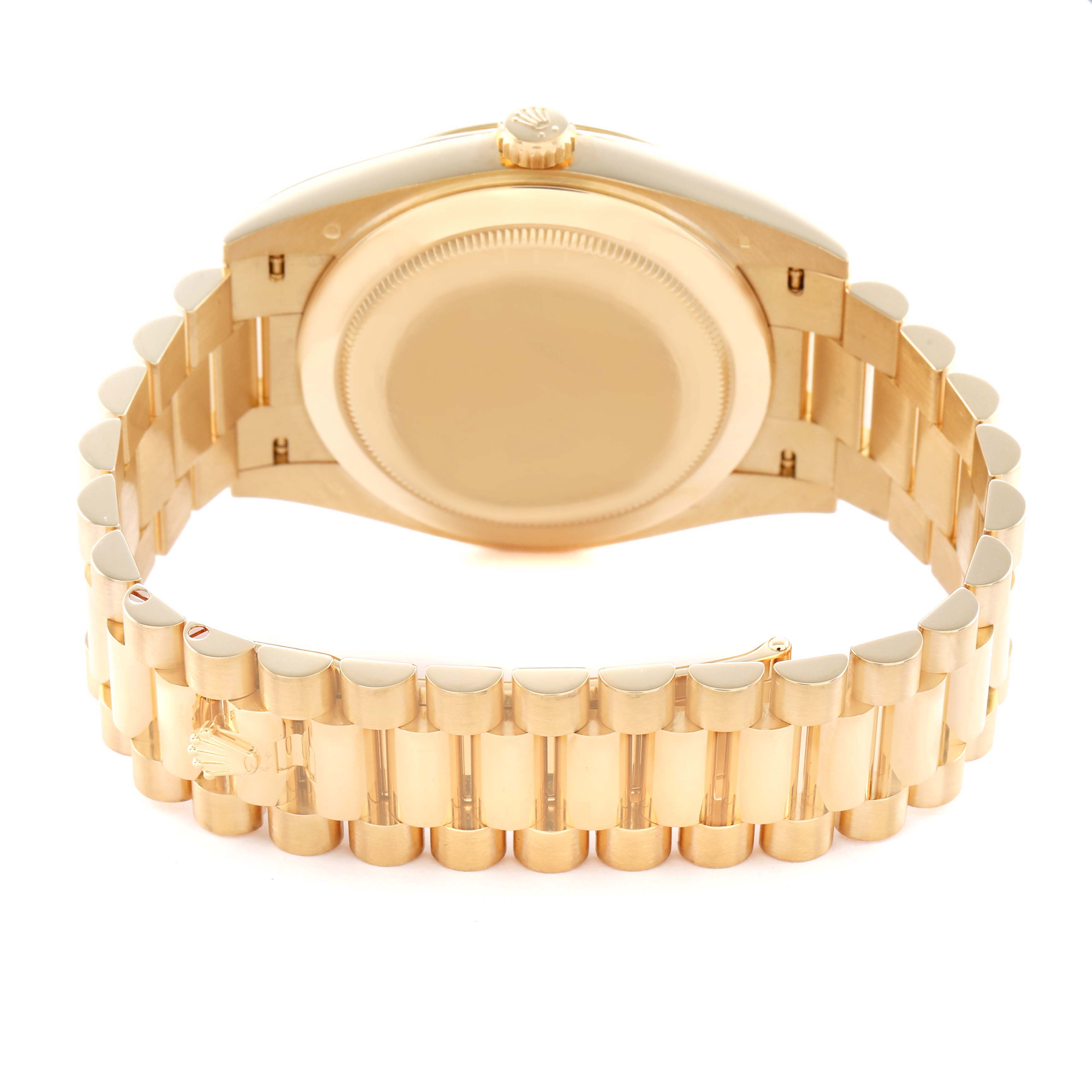 The Rolex President 228238 Men's Yellow Gold Champagne Dial watch is shown from the back, highlighting its clasp and bracelet design.