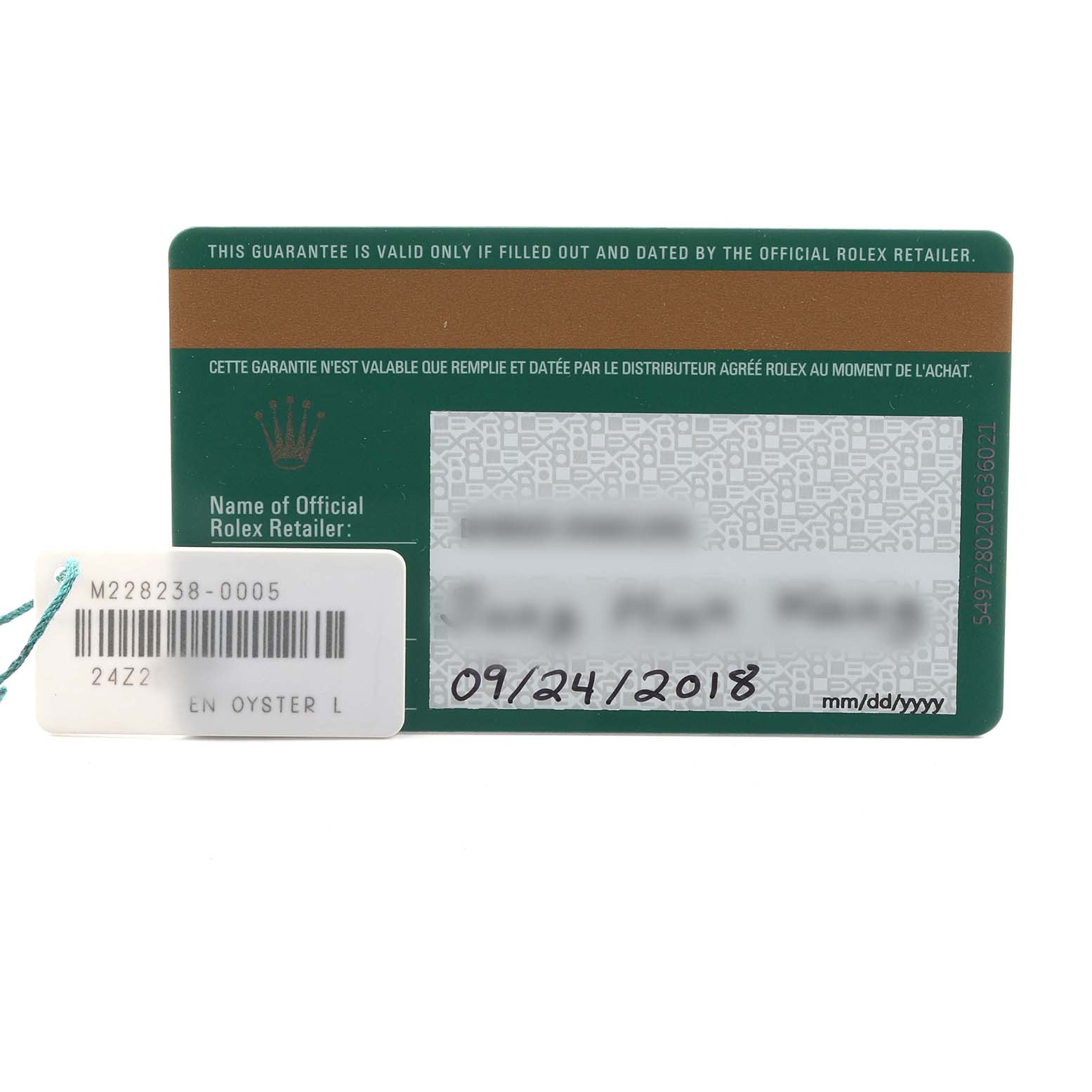 The image shows a warranty card for the Rolex President 228238 Men's Yellow Gold Champagne Dial model and a barcode tag from a frontal angle.