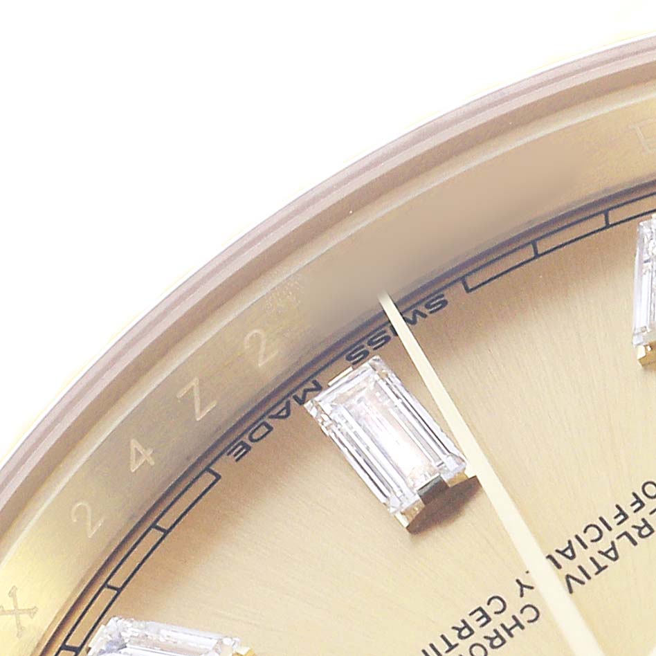 The image shows a close-up of a Rolex President 228238 Men's Yellow Gold Champagne Dial watch dial with diamond markers and the engraved inner bezel.